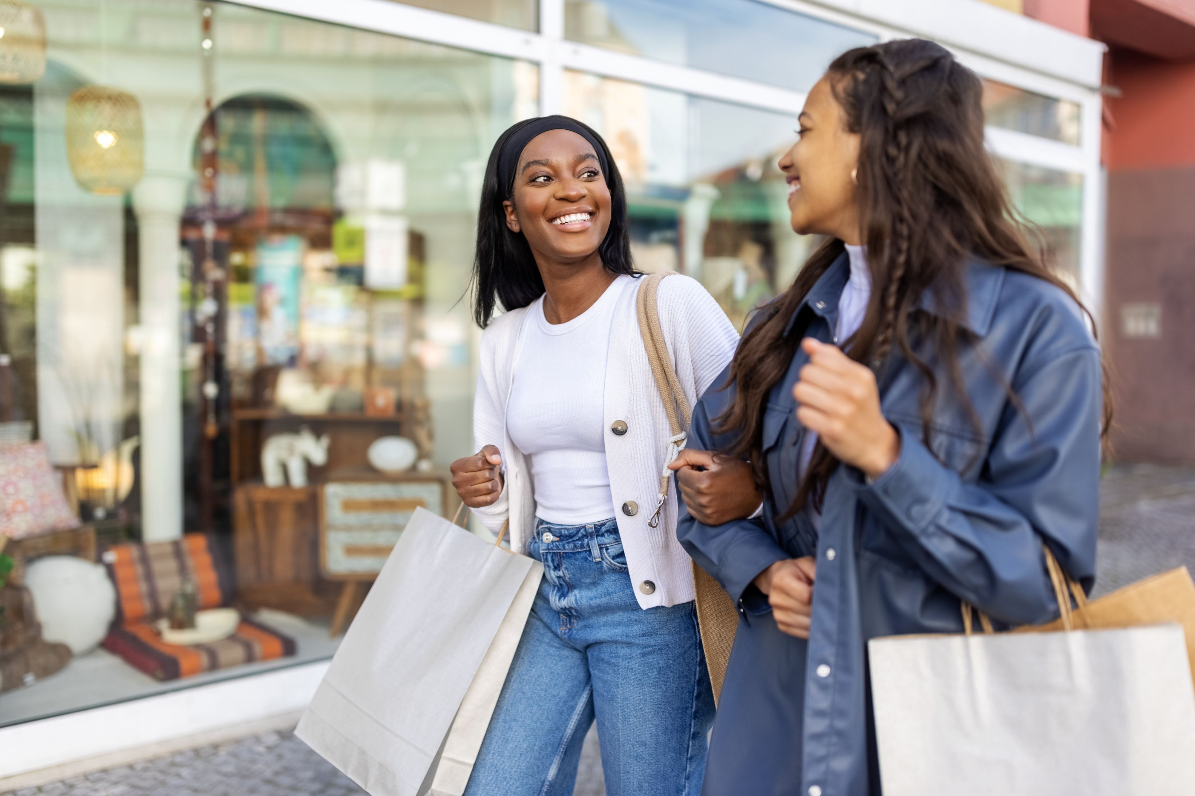 Guests enjoy shopping and exploring local storefronts.