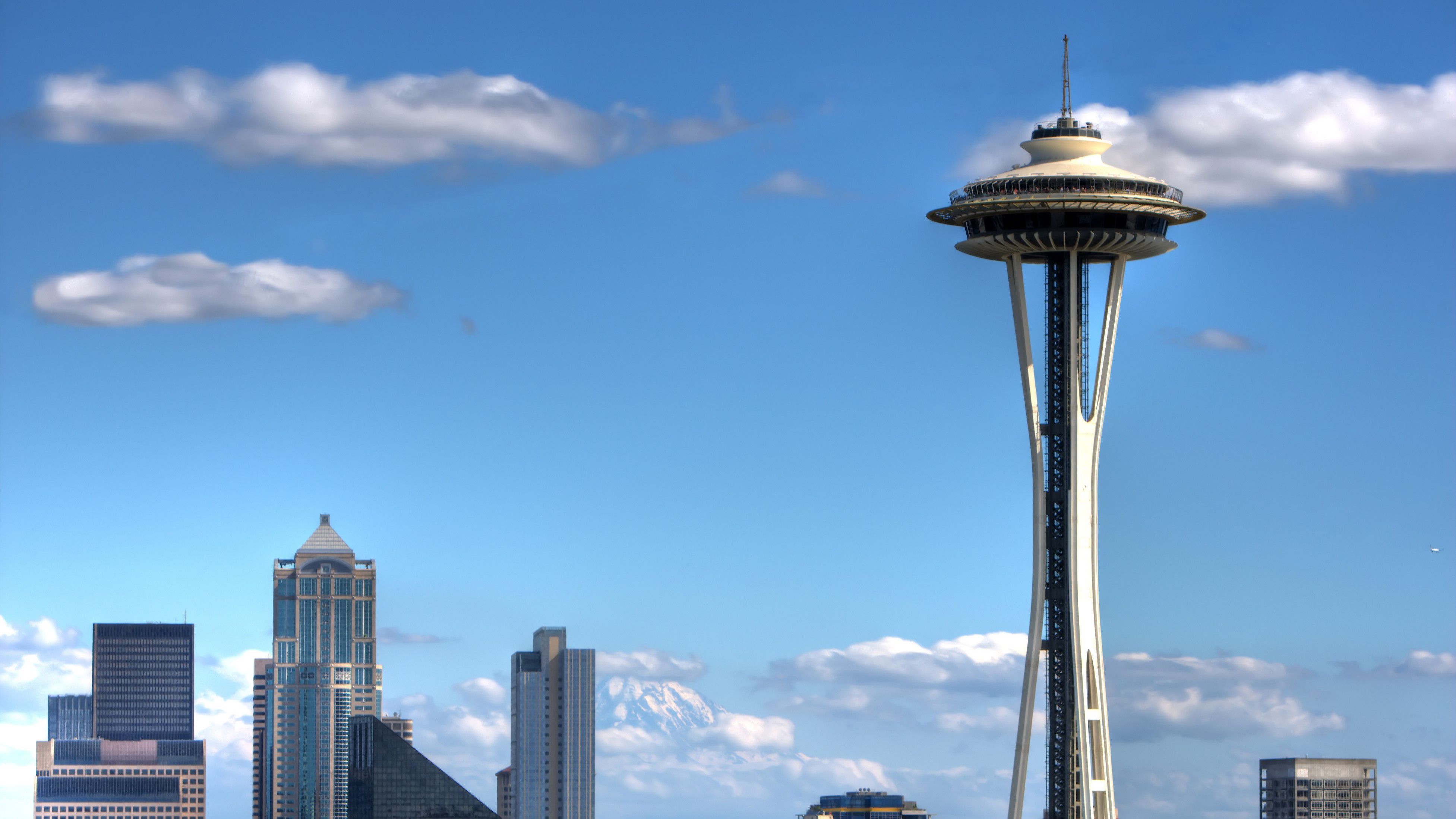 Seattle's iconic Space Needle in front of a blue sky