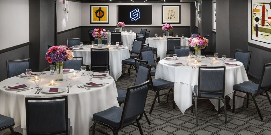 Hotel Spero California meeting space with round tables