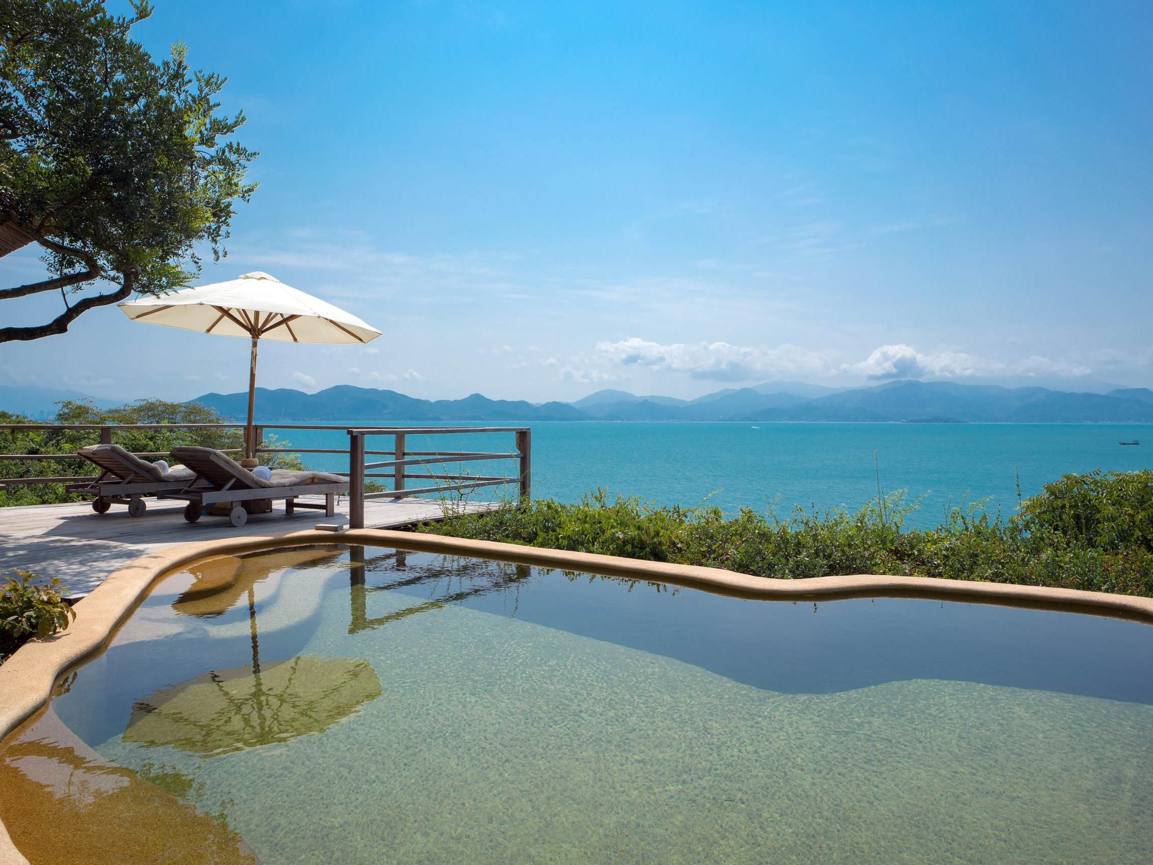 These villas have a beautiful view atop the hill with private pool