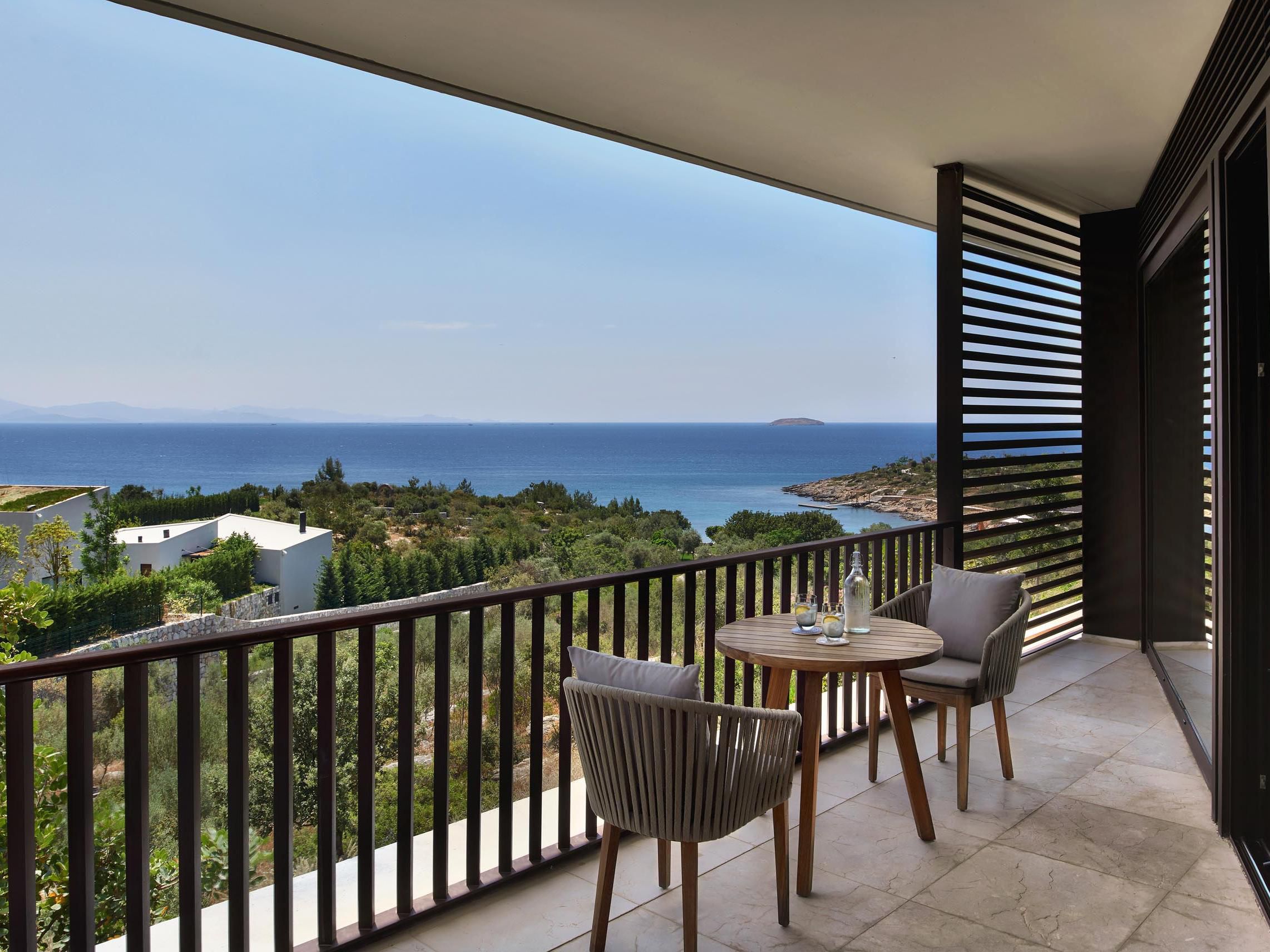 A spacious, stylish suite with a living area opens onto a terrace