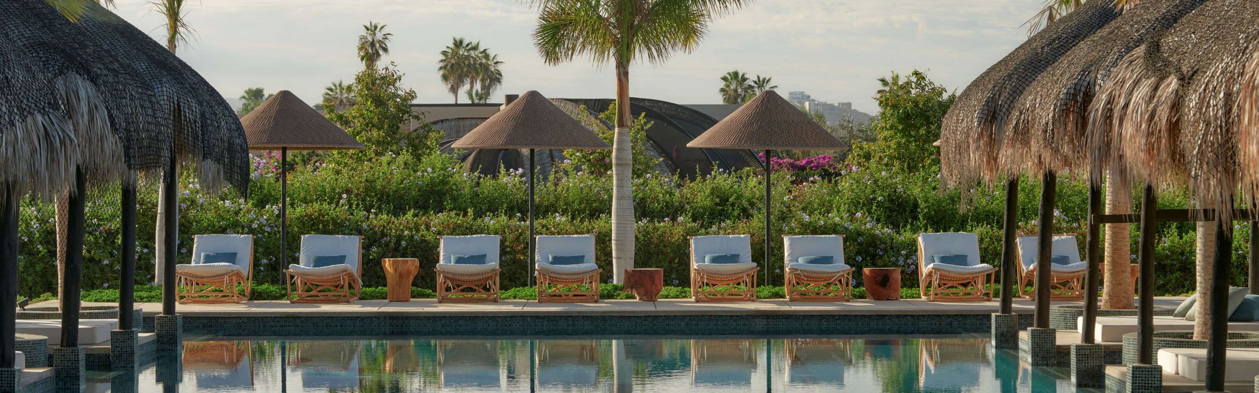 Spa pool with lounge chairs.