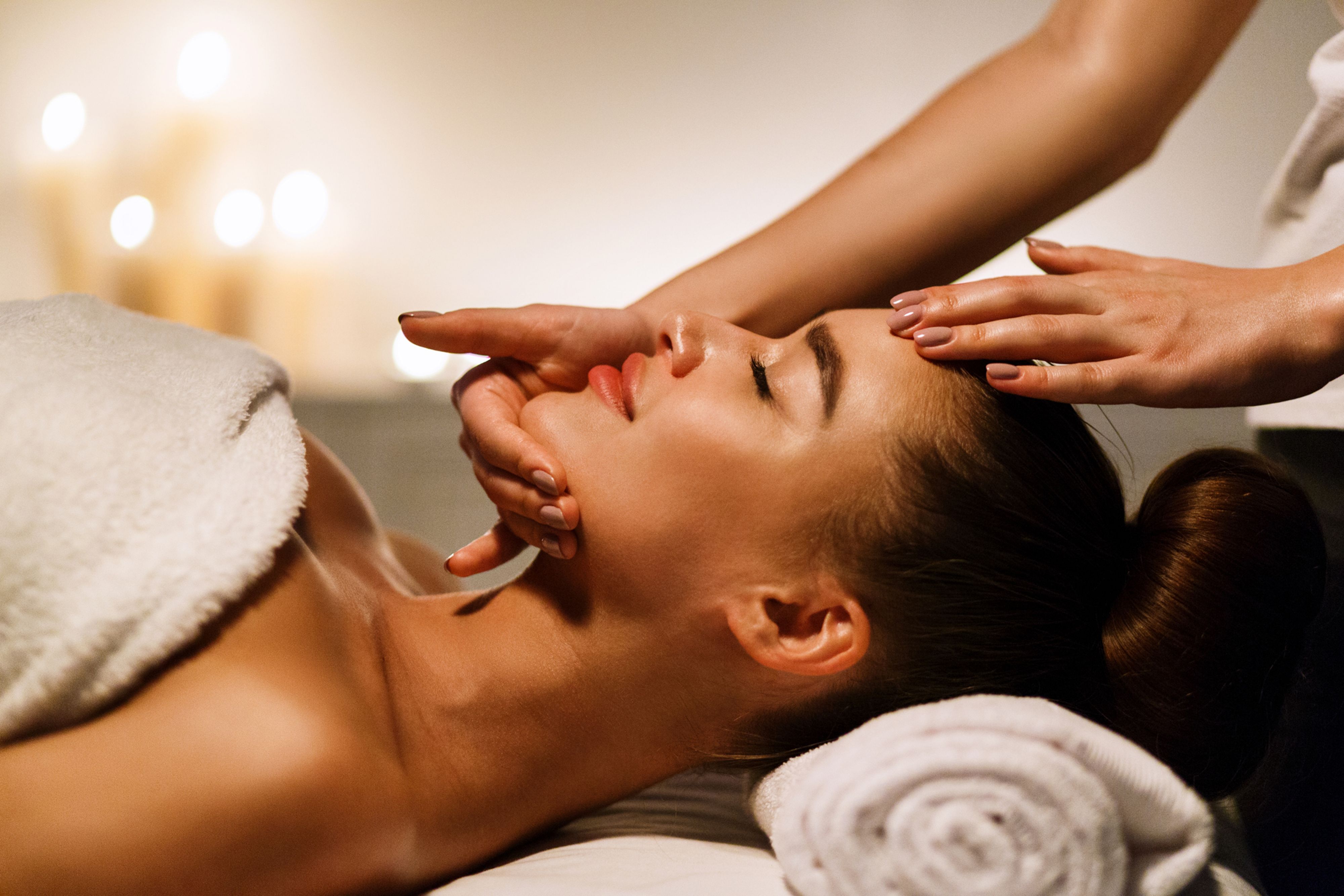 woman at spa getting a facial