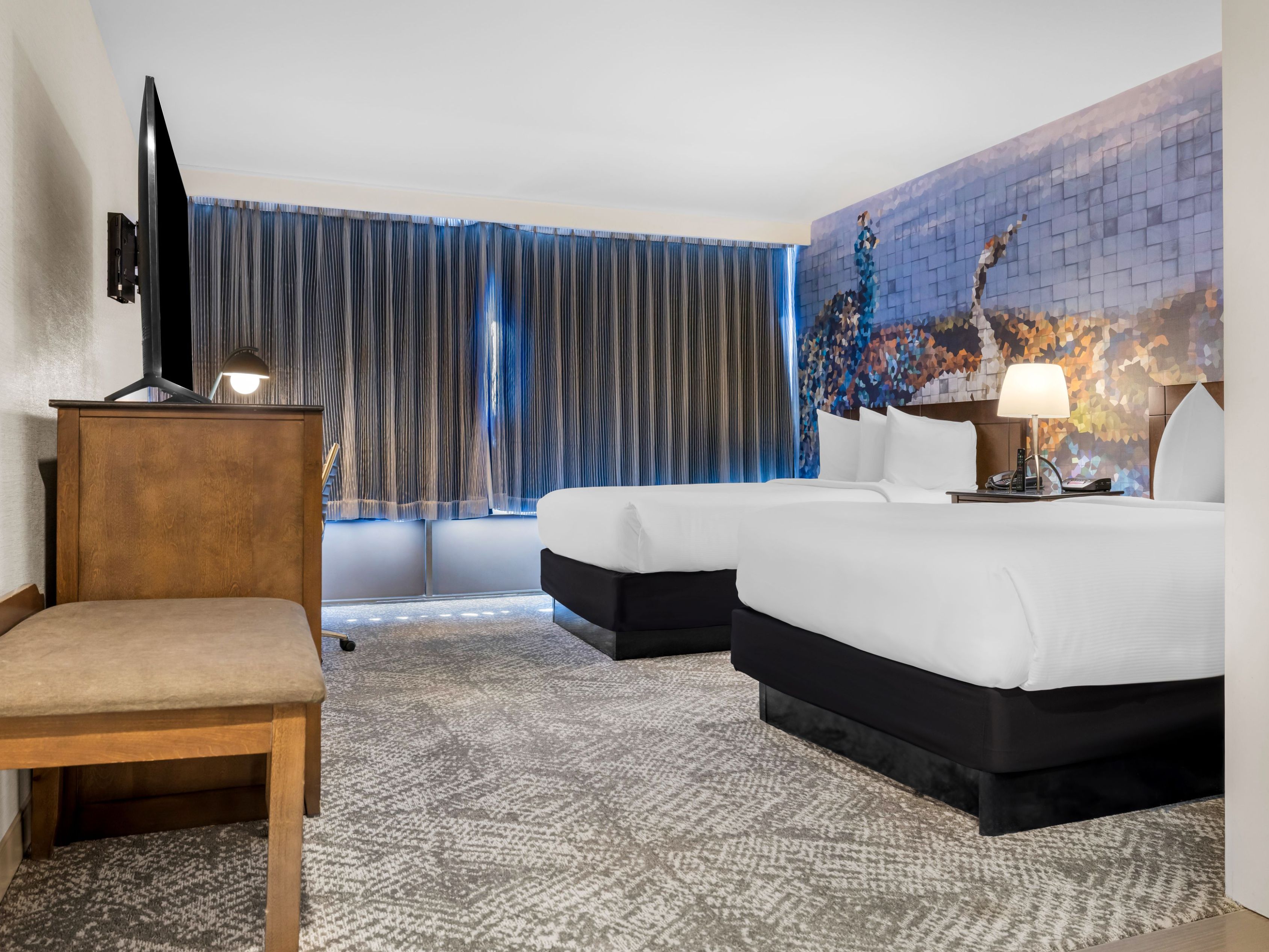 Queen beds in a cozy room