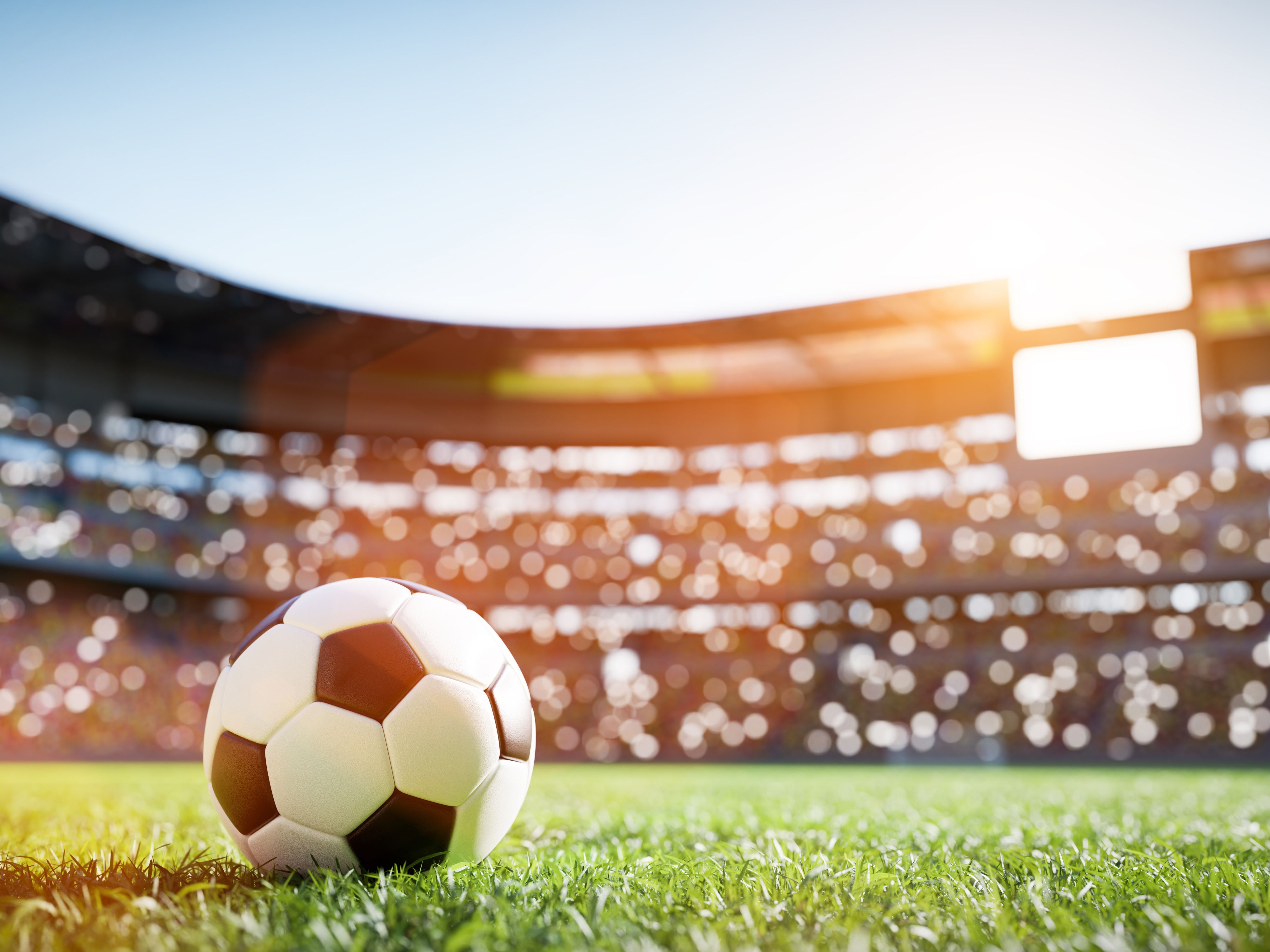 Soccer ball on pitch at a stadium