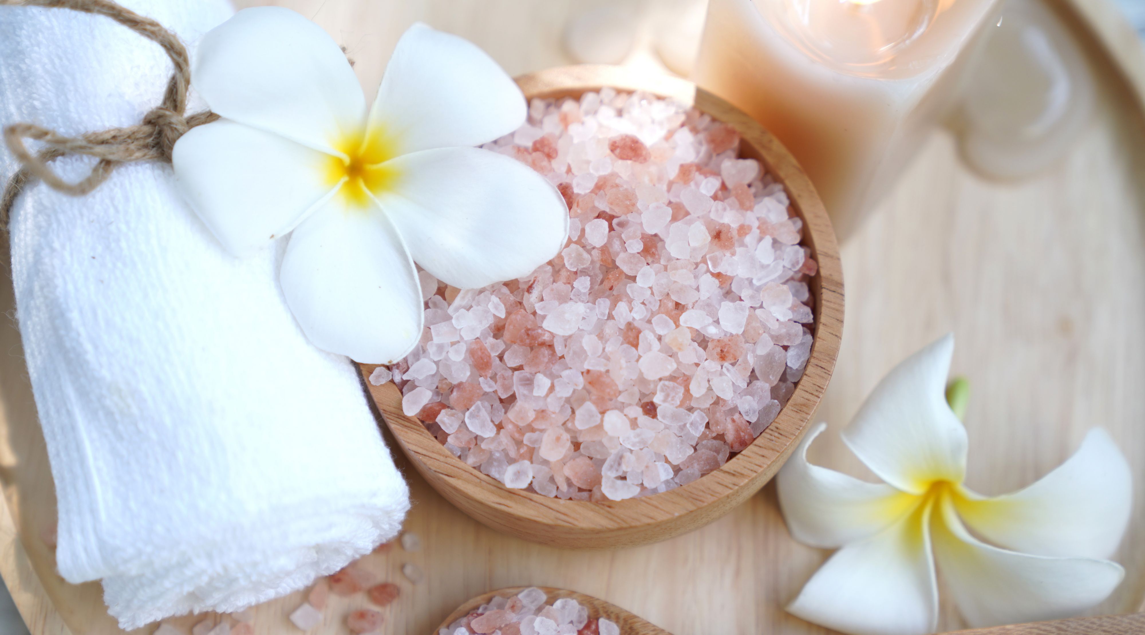 Spa scene with sea salt and orchids