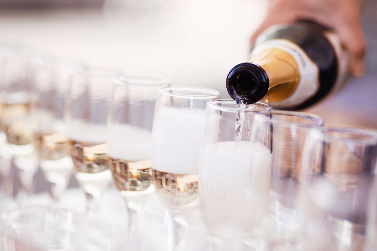 Sparkling wine being poured into glasses