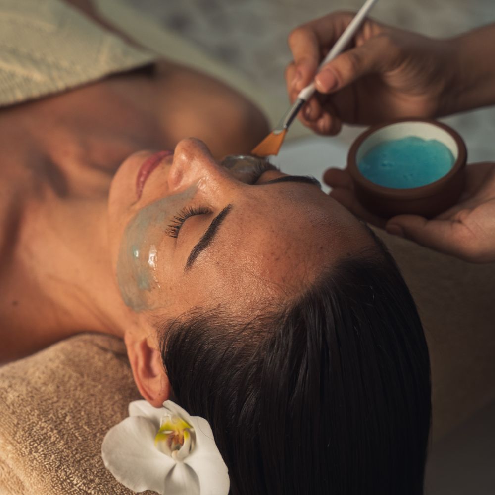 woman at spa getting a facial