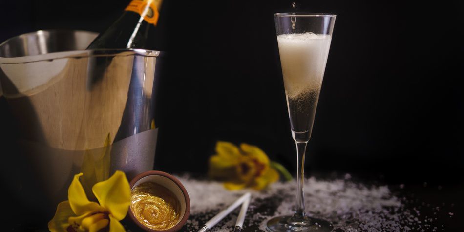  Champagne flute with spa setup and floral accents