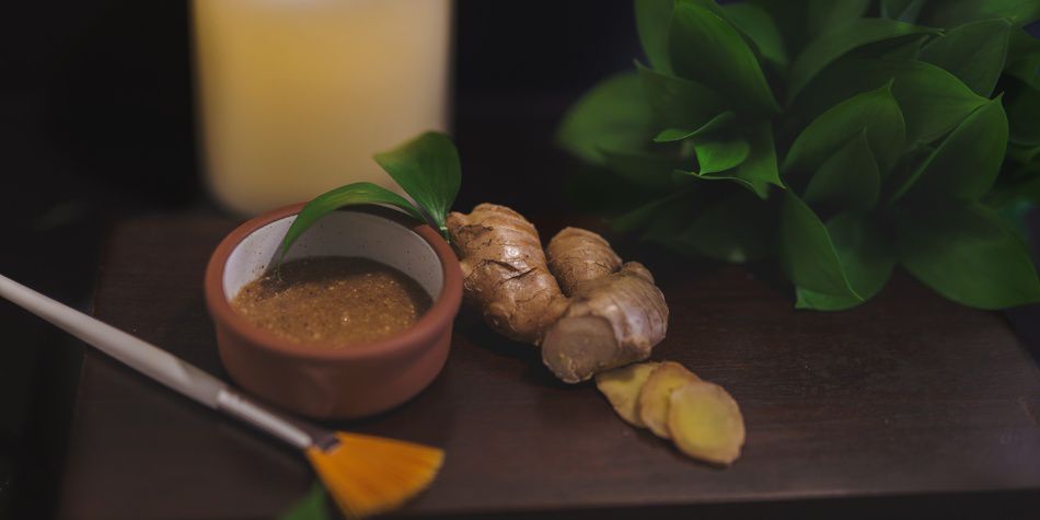 Ginger spa treatment with natural ingredients and brush