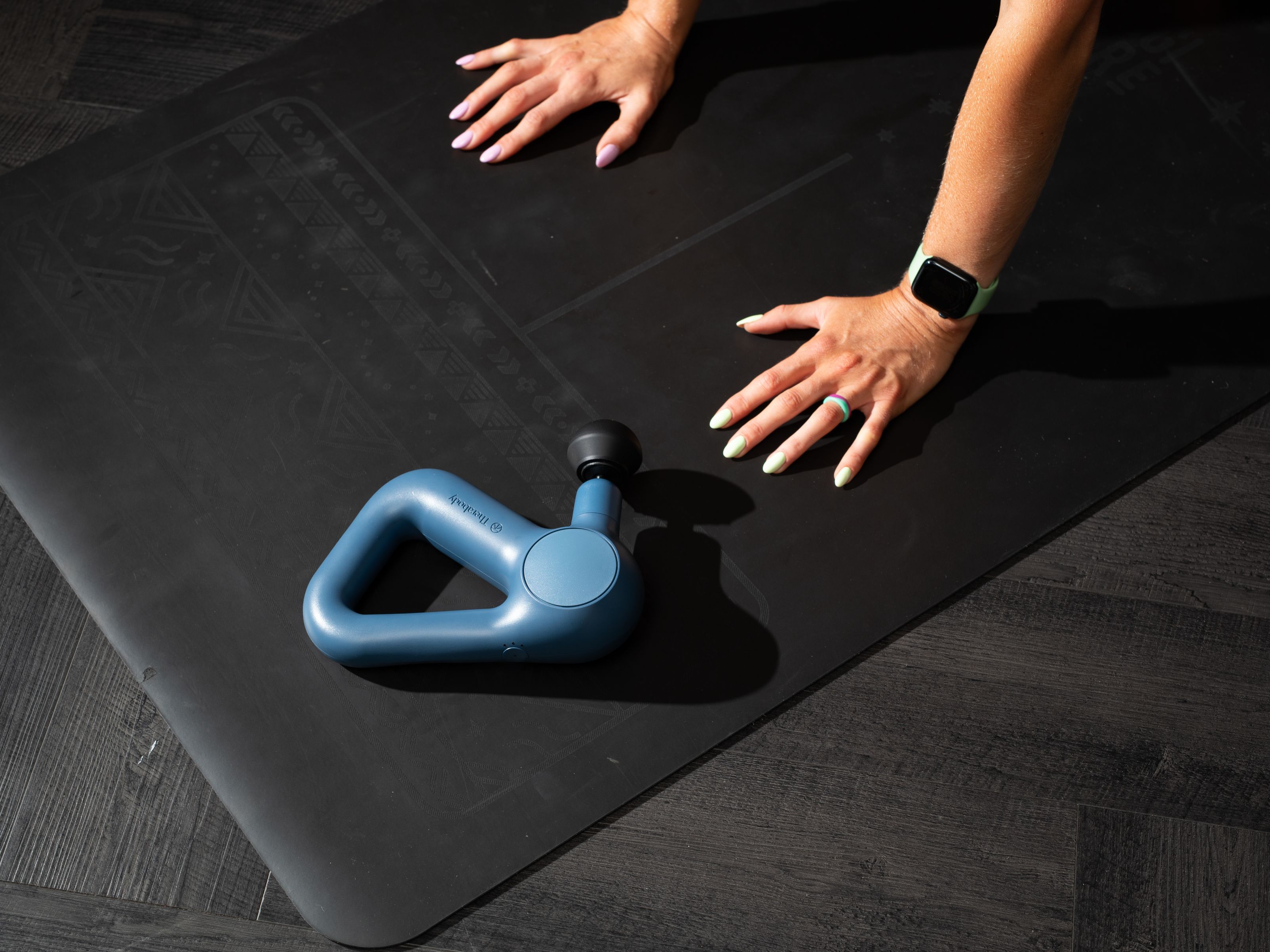Guest hands on mat for yoga