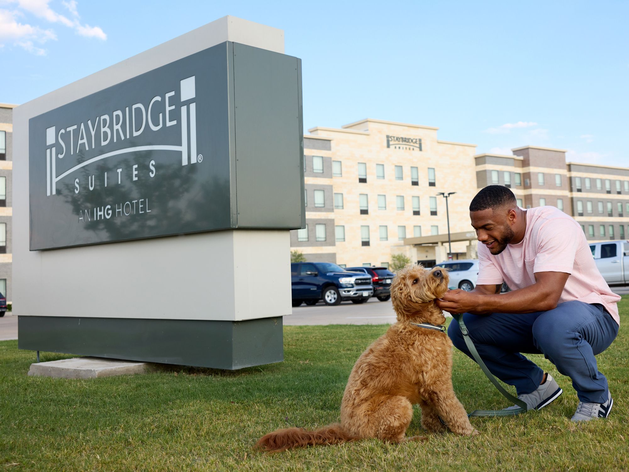 A guest with his dog outside