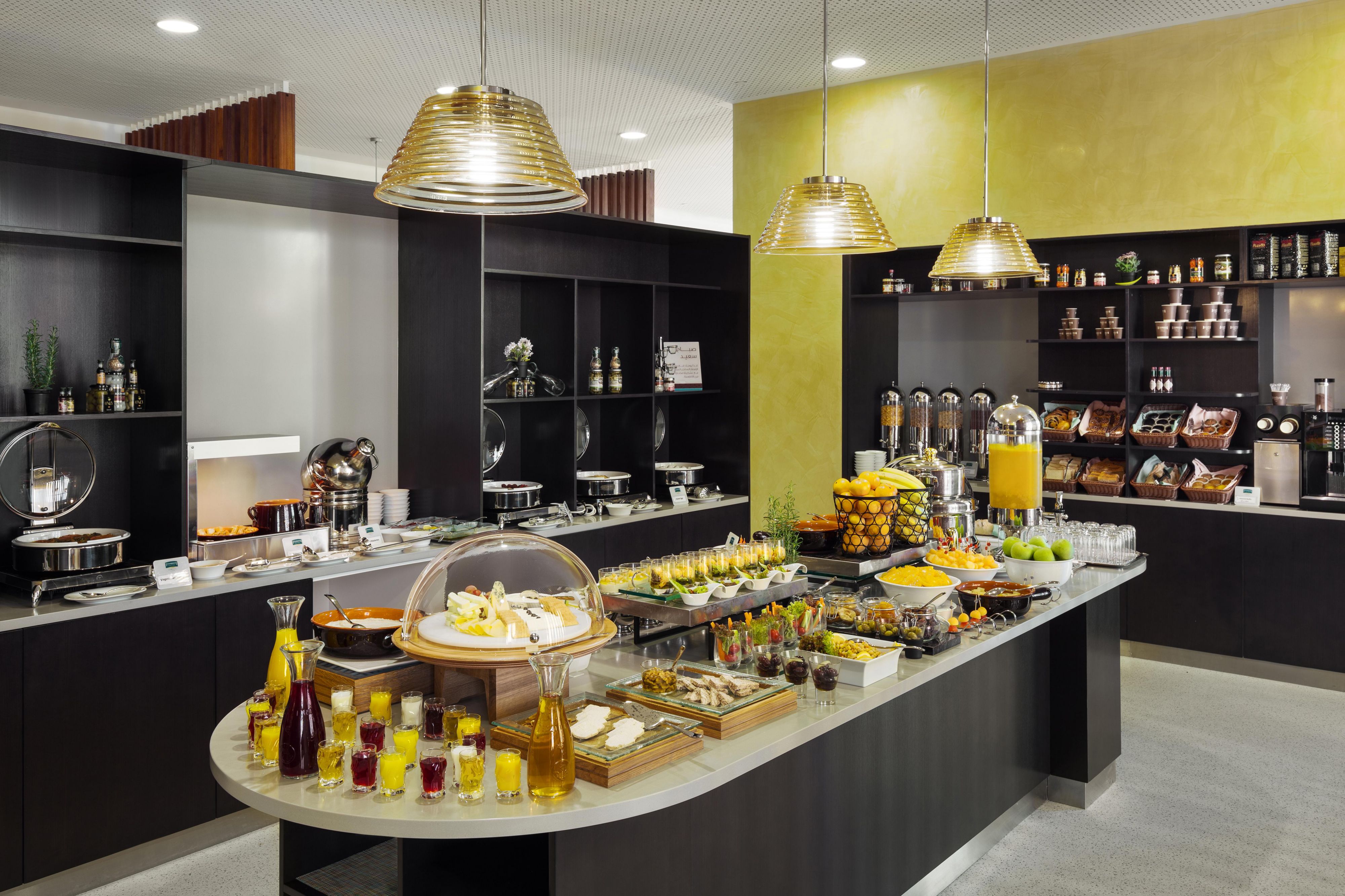 The Gathering Table is a large restaurant that can accommodate up to 140 diners. Guests can enjoy a hot breakfast buffet every morning, which is included in the room rate. three times weekly evening socials dinners .