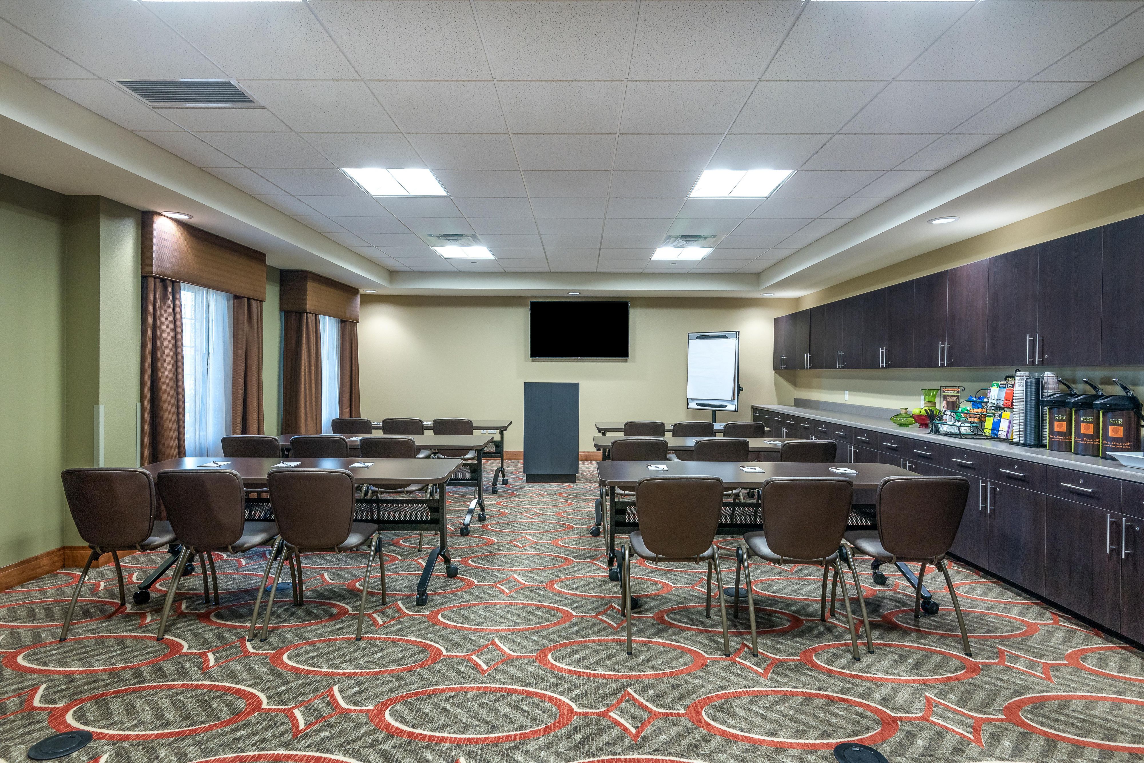 Hold your next corporate meeting here with us. Or host your next family gathering in the comfort of our room which can accommodate up to 32 people. You're welcome to bring in your family favorites for catering or order from one of our local restaurants to have delivered. Whatever the need, we have the space for you. Contact us for more information.