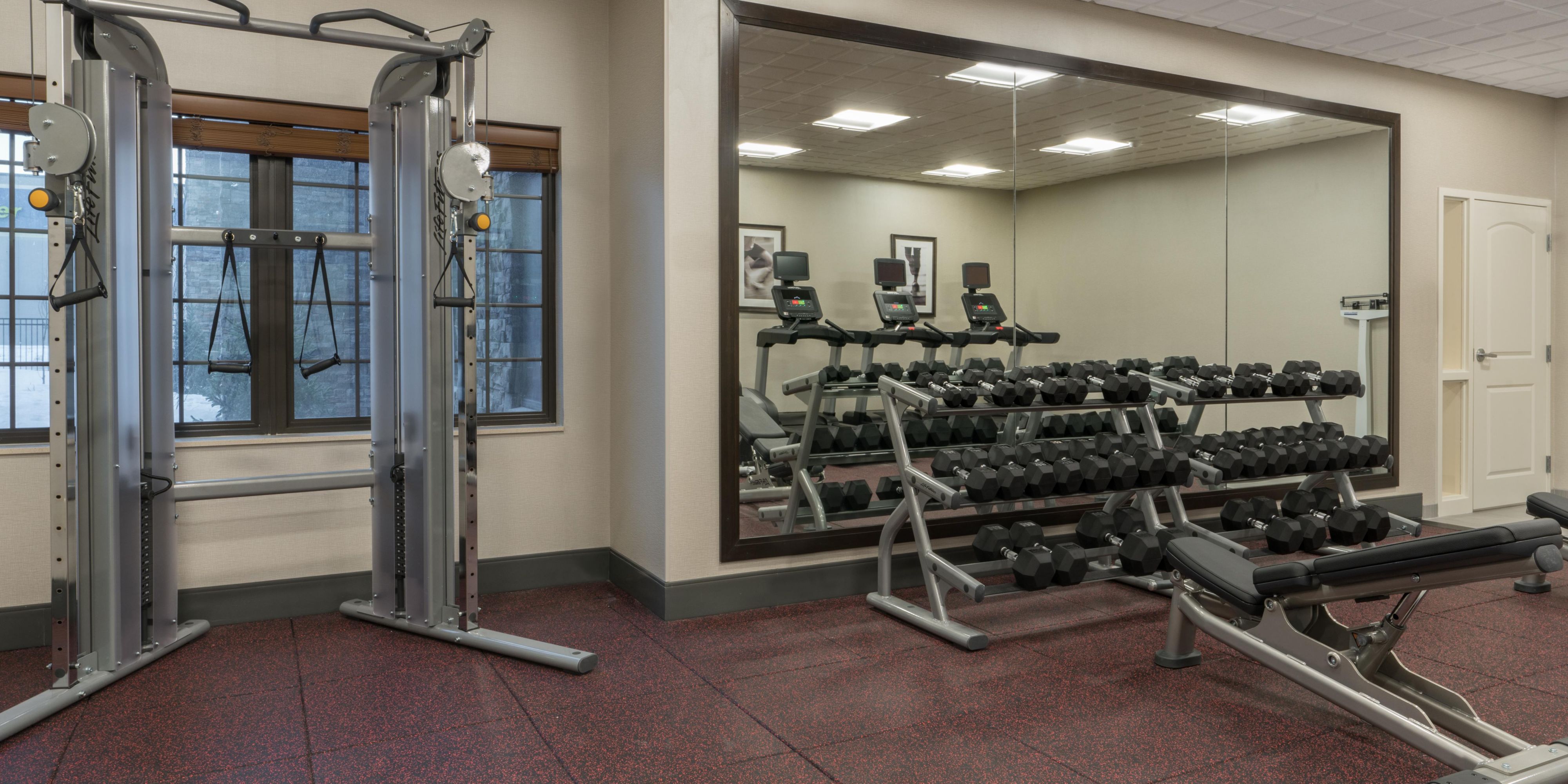 Workout in our fitness center. Weights, treadmill, elliptical 