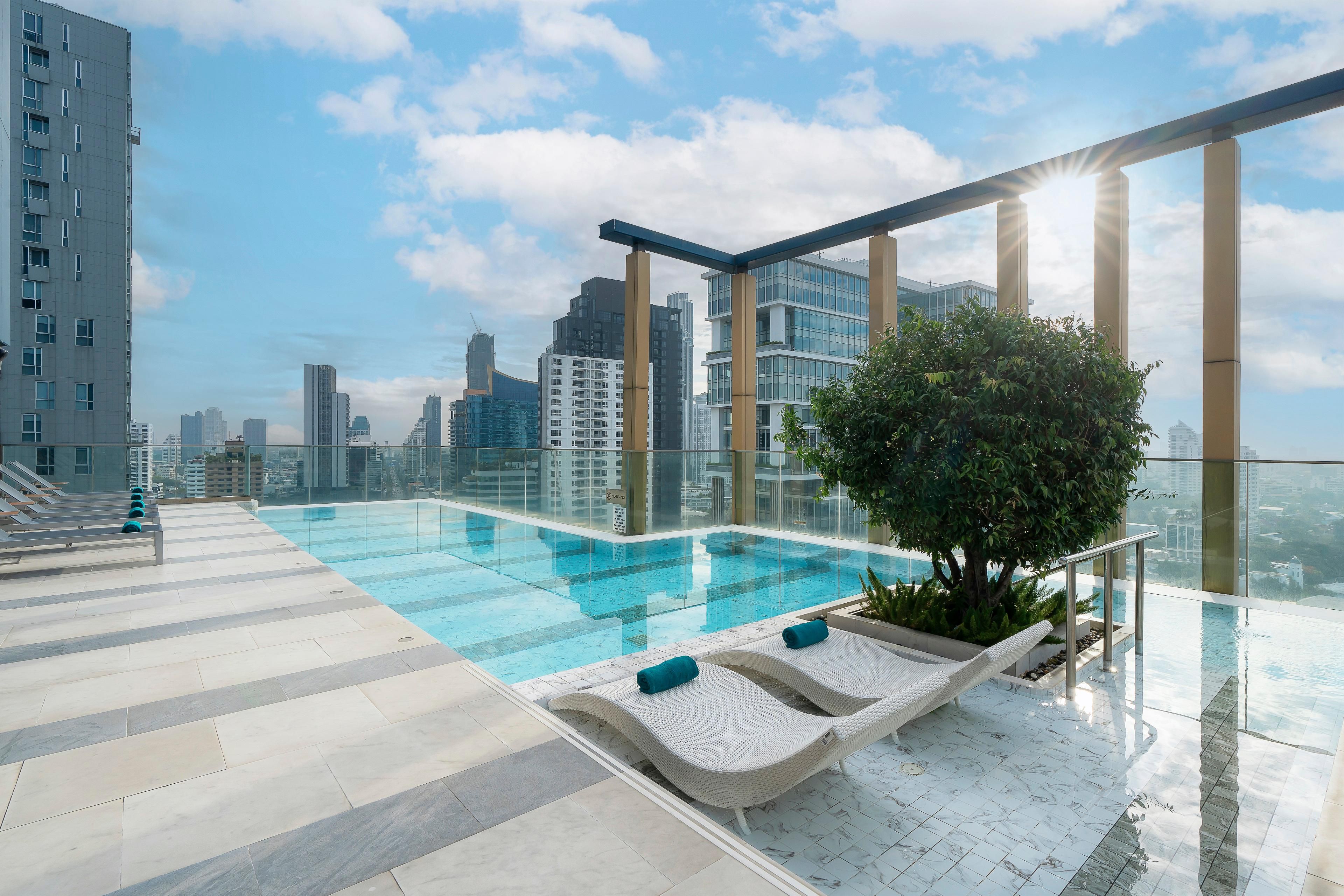 Dive into relaxation on our rooftop pool deck with stunning Bangkok skyline views, or maintain your routine at our 24-hour fitness center equipped with modern cardio and strength equipment. Whether you're starting your day with morning laps or unwinding after exploring the city, these spaces keep you energized and refreshed throughout your stay.