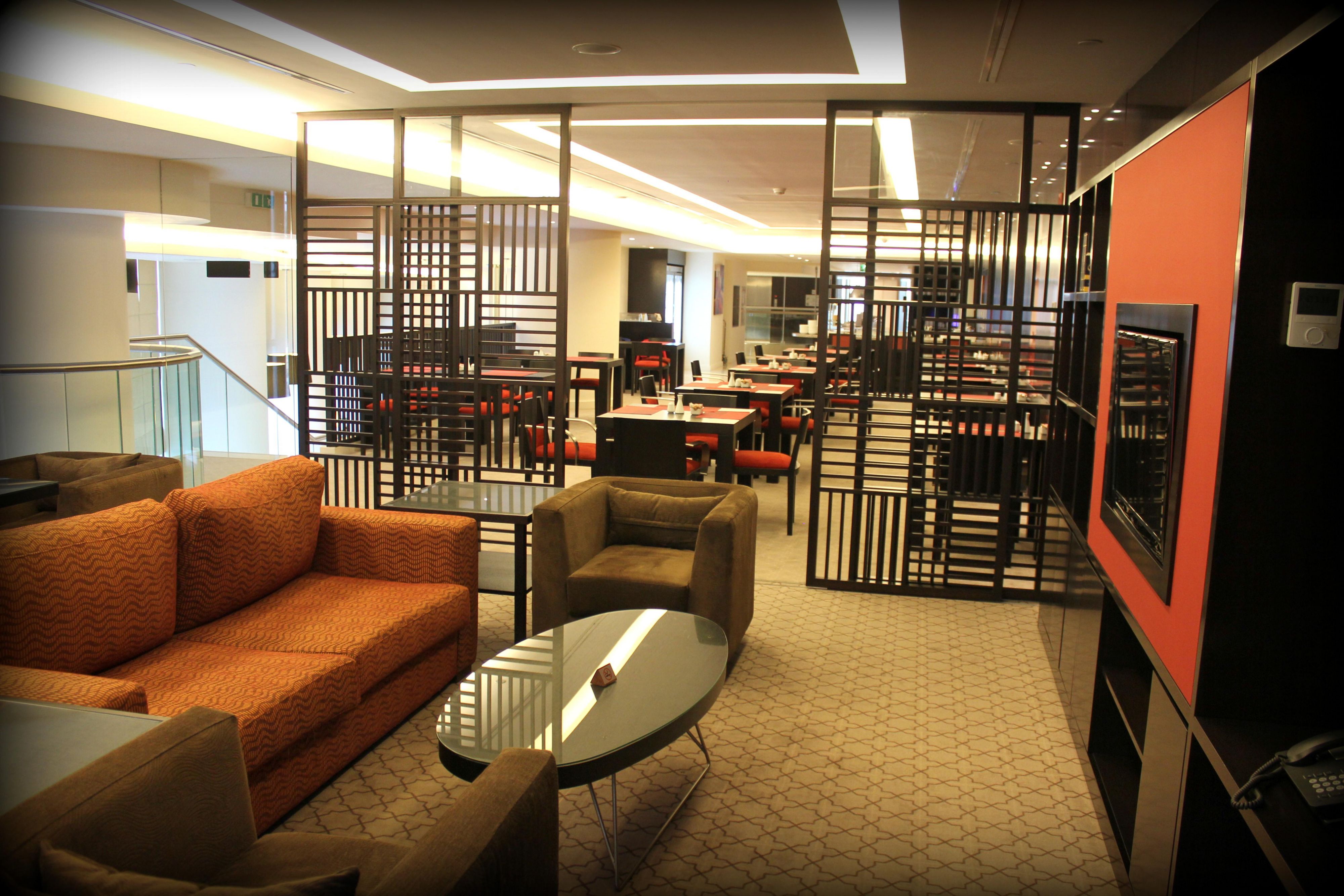 Unwind in The Den - hotel’s lounge area and entertainment hub - where you’ll find comfortable sofas, a reading nook, and a large-screen TV. It’s the perfect place to wind down after work, and to meet your fellow residents.