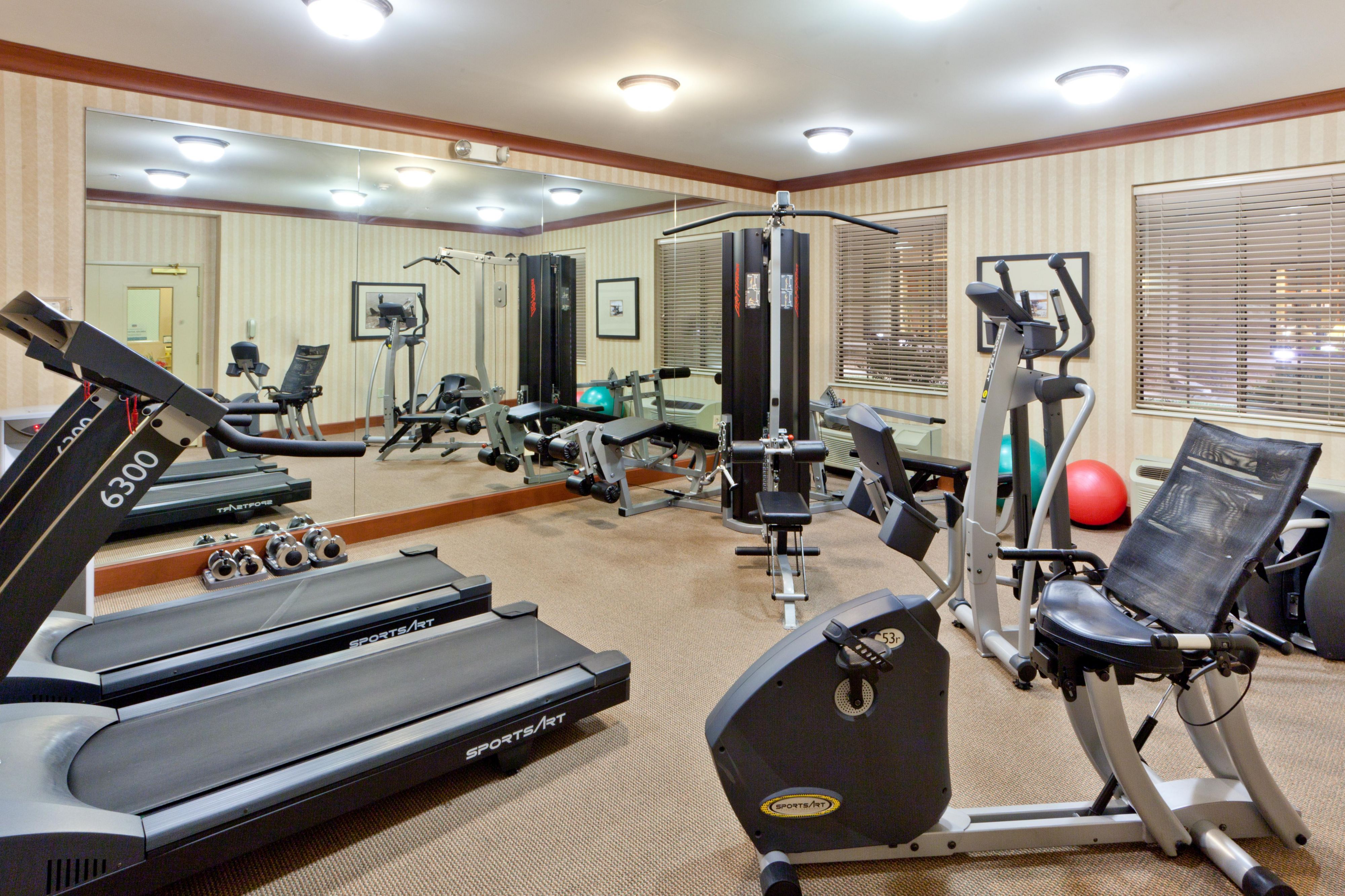 Get an invigorating workout in our 24-hour Fitness Center with equipment by Matrix. Our state-of-the-art gym is equipped with two treadmills, an elliptical machine, and an exercise bike, all with independent TV screens. Do some training with our universal weight machine, free weights, and exercise ball.