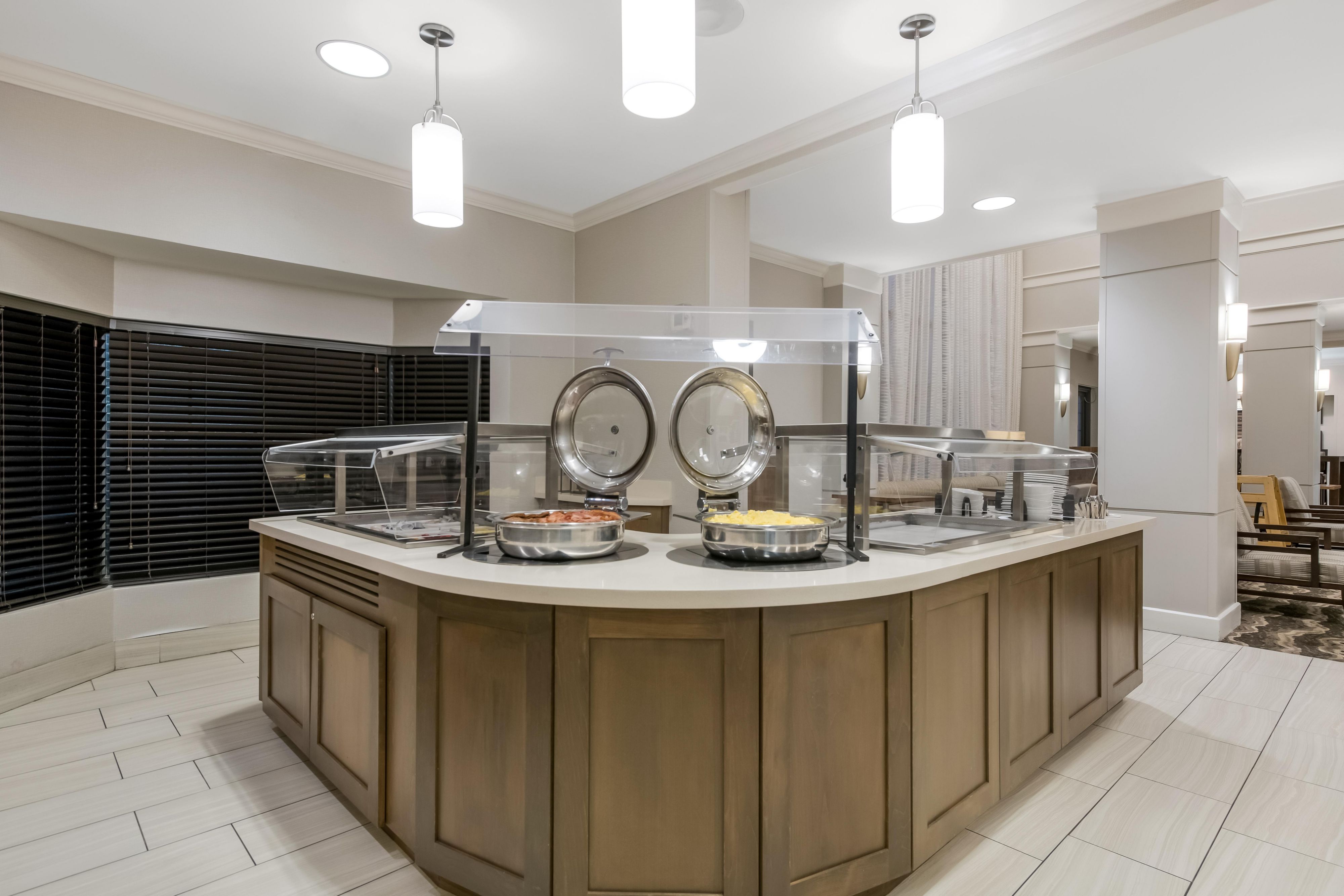 Awaken to the enticing aroma of a sizzling, hearty breakfast freshly prepared for you. And the best part? It's entirely complimentary! Plus, we like to spice things up so our long-term guests can enjoy a variety of mouth-watering options. 