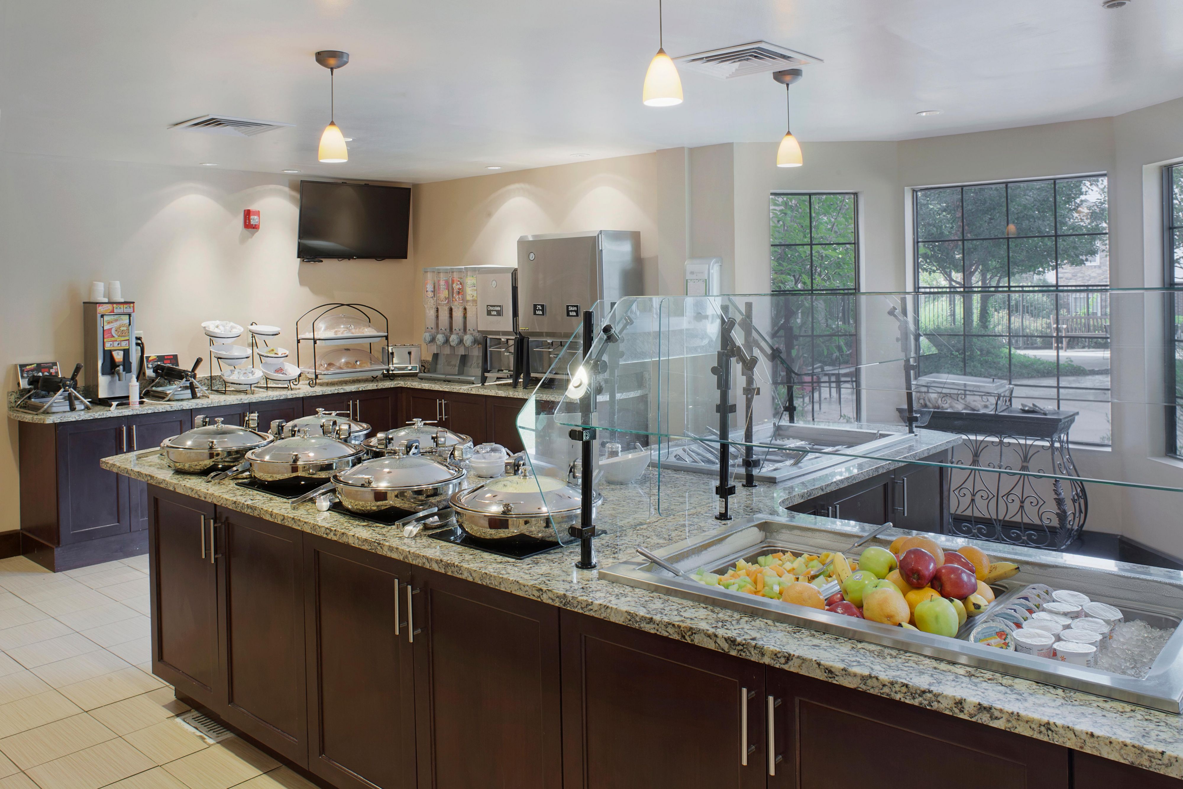 Wake up to a complimentary breakfast buffet every day during your stay. Featuring eggs, bacon, Belgian waffles, fresh fruit, juices and an assortment of other hot and cold items the breakfast buffet is sure to get your day off to a great start.