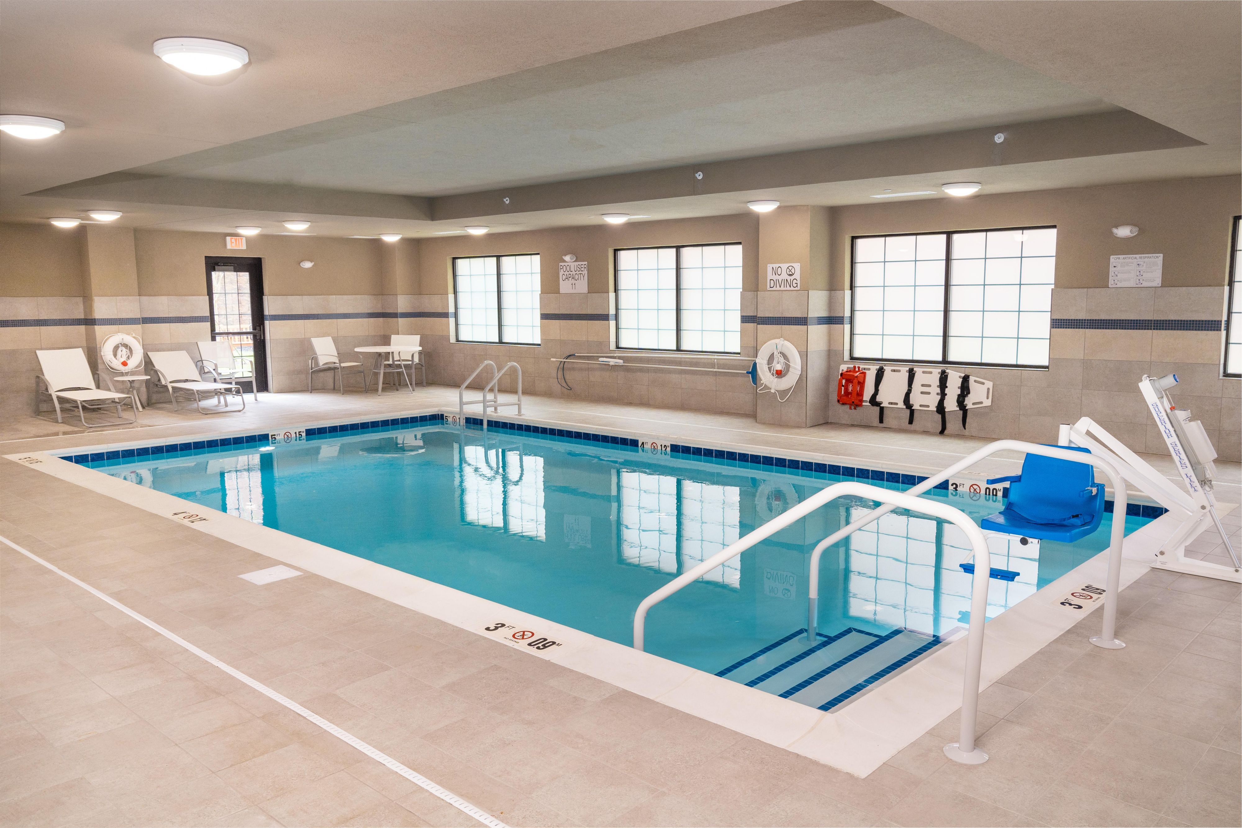 Splash in our heated indoor pool with an ADA-accessible pool lift, poolside chairs and tables, lounge chairs, and fresh towels. Relaxation is yours in our rejuvenating pool room.