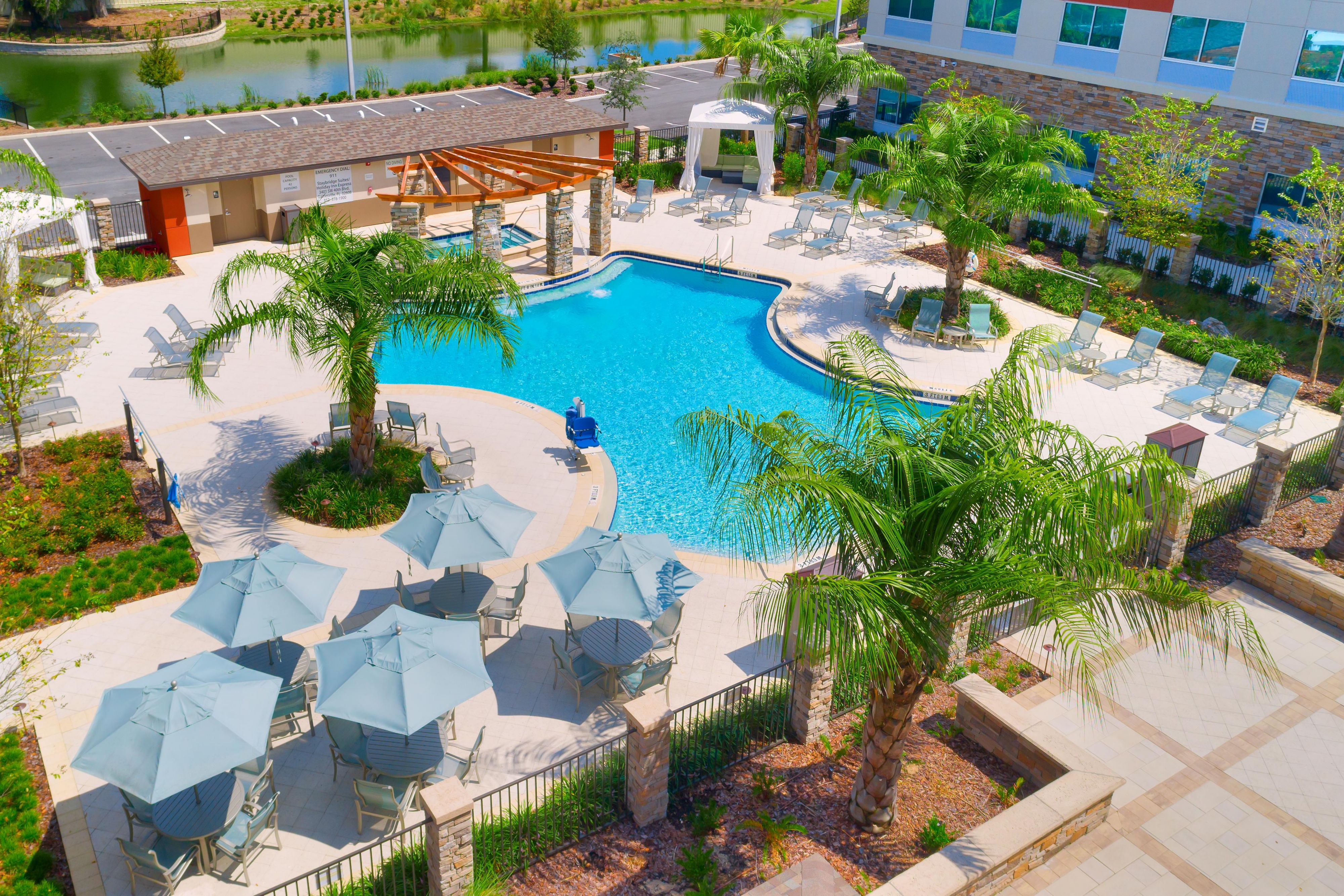 The brand new Staybridge Suites offers a large resort style pool and spa area with 2 cabanas, 3 grills, fire pit, lots of outdoor seating for eating, relaxing or social gatherings
