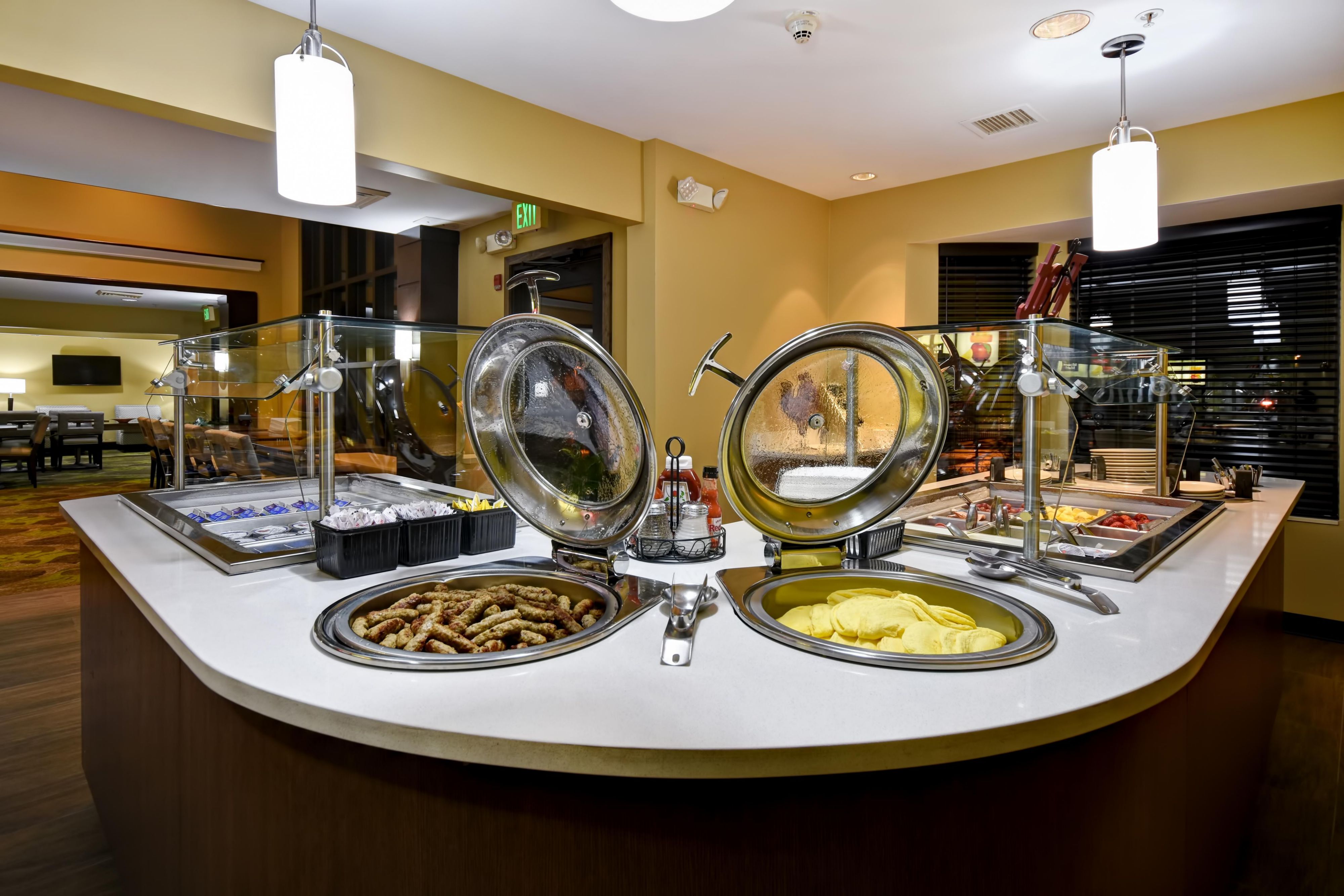 Enjoy a Complimentary Hot Breakfast when you stay at the Staybridge Suites Grand Rapids. With daily selections of scrambled eggs, sausage or bacon, yogurt parfait station, make your own waffle station, cereals, breads, fresh baked blueberry muffins, oatmeal and more you will easily be satisfied each and every day.