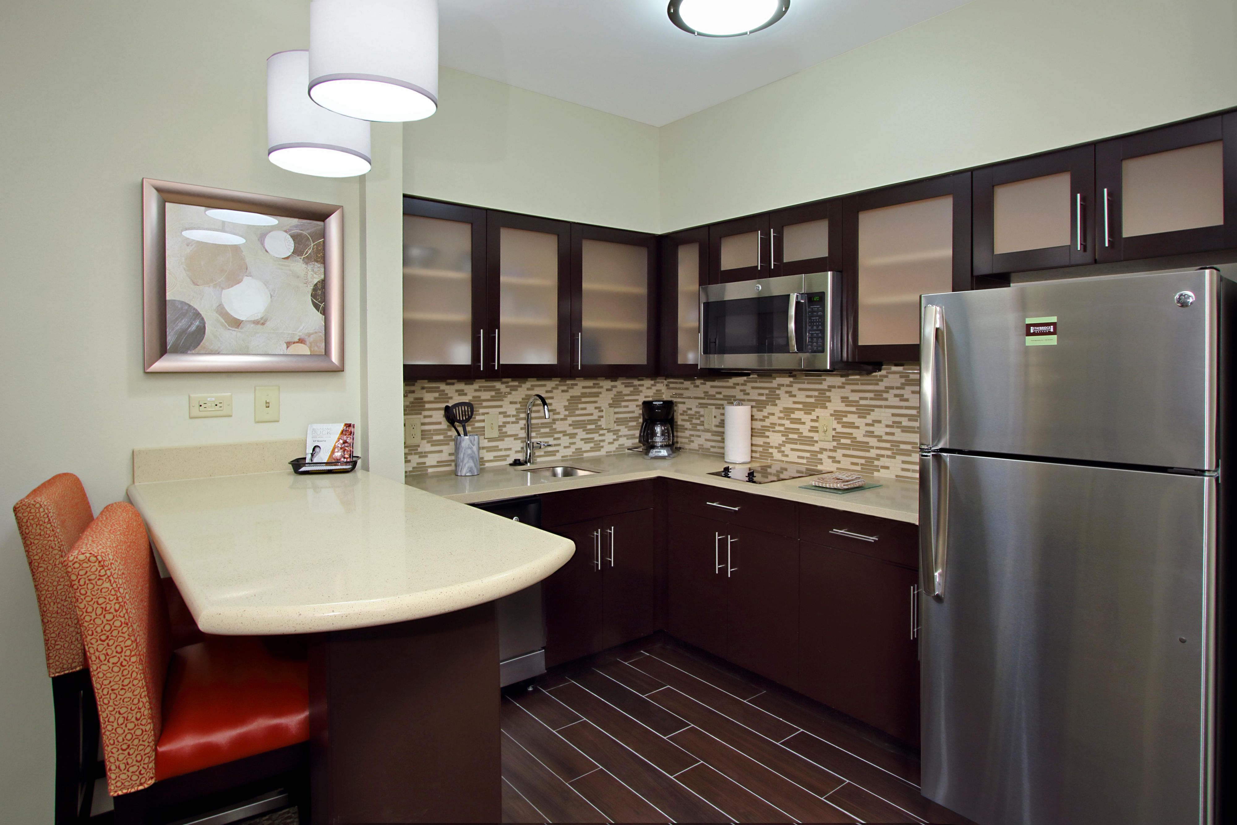 At your convenience we include fully equipped kitchens in all our rooms! We include pots, pans, silverware, chinaware, dishwasher and much more!