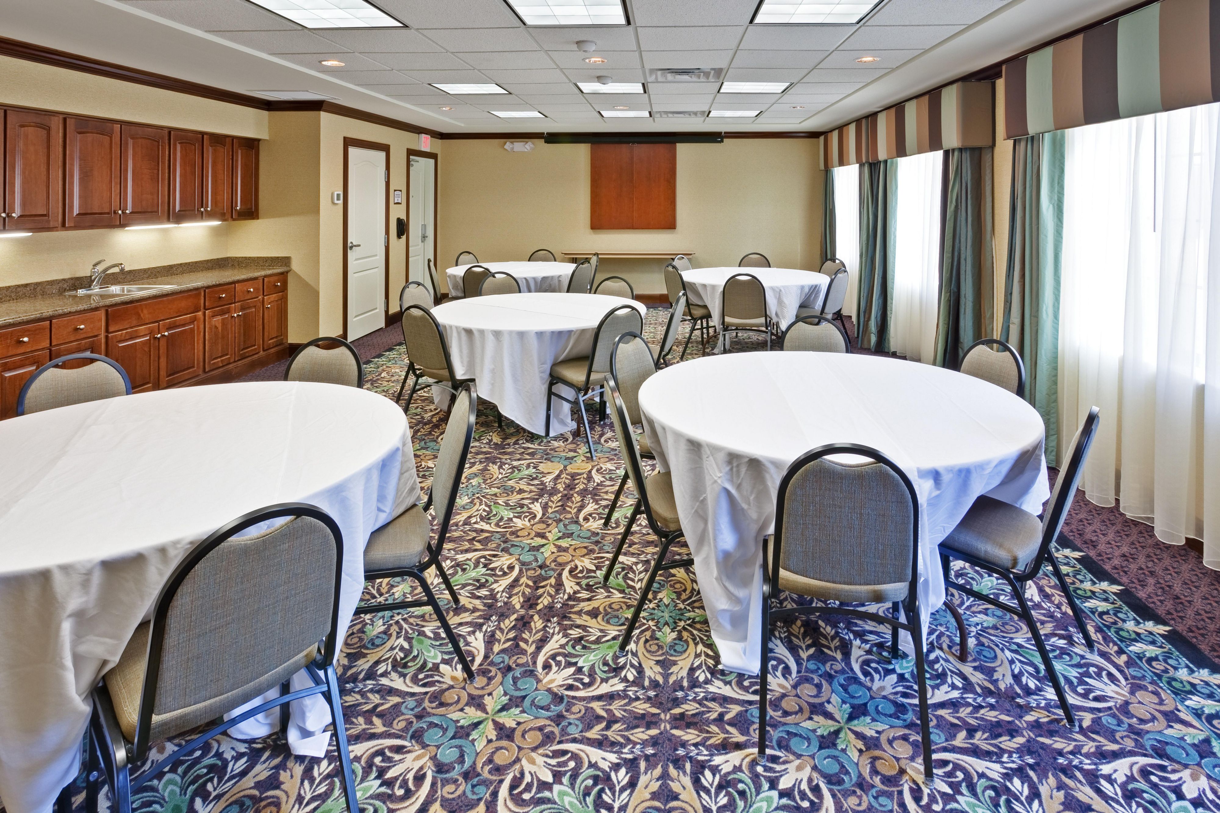 Our meeting room is the perfect space for your next meeting. With a variety of options perfect for any meeting up to 35 people. Classroom style, board meeting, or breakout rounds are all available for setup.