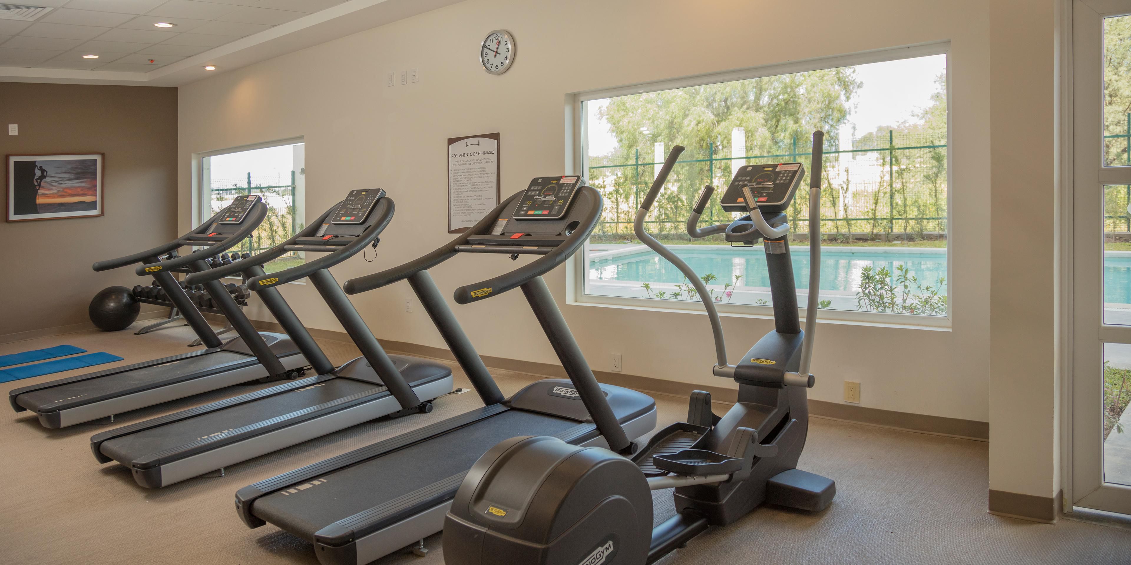 Stay active and relax at a hotel with pool and gym facilities.