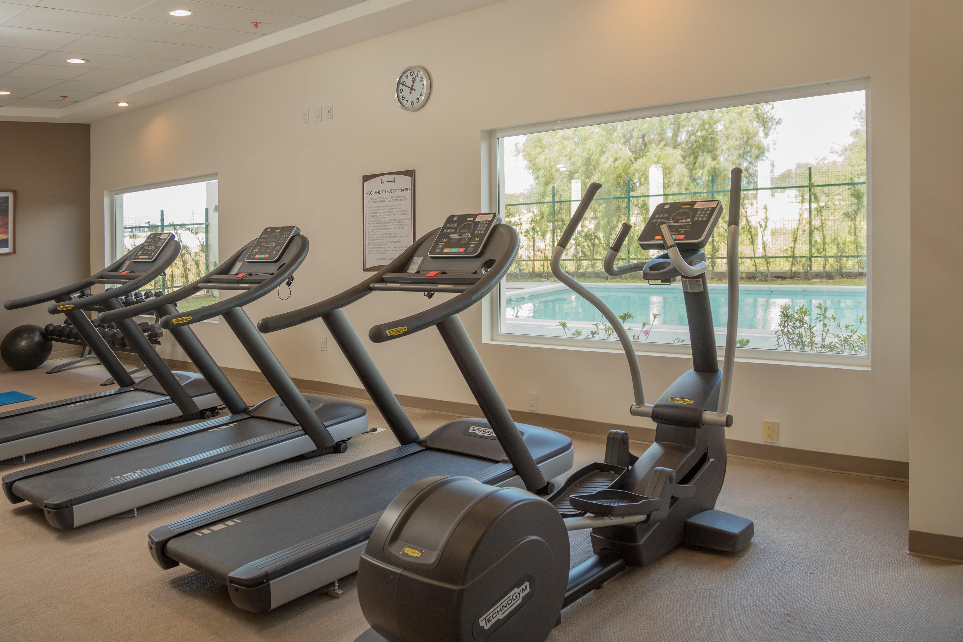 Stay active and relax at a hotel with pool and gym facilities.