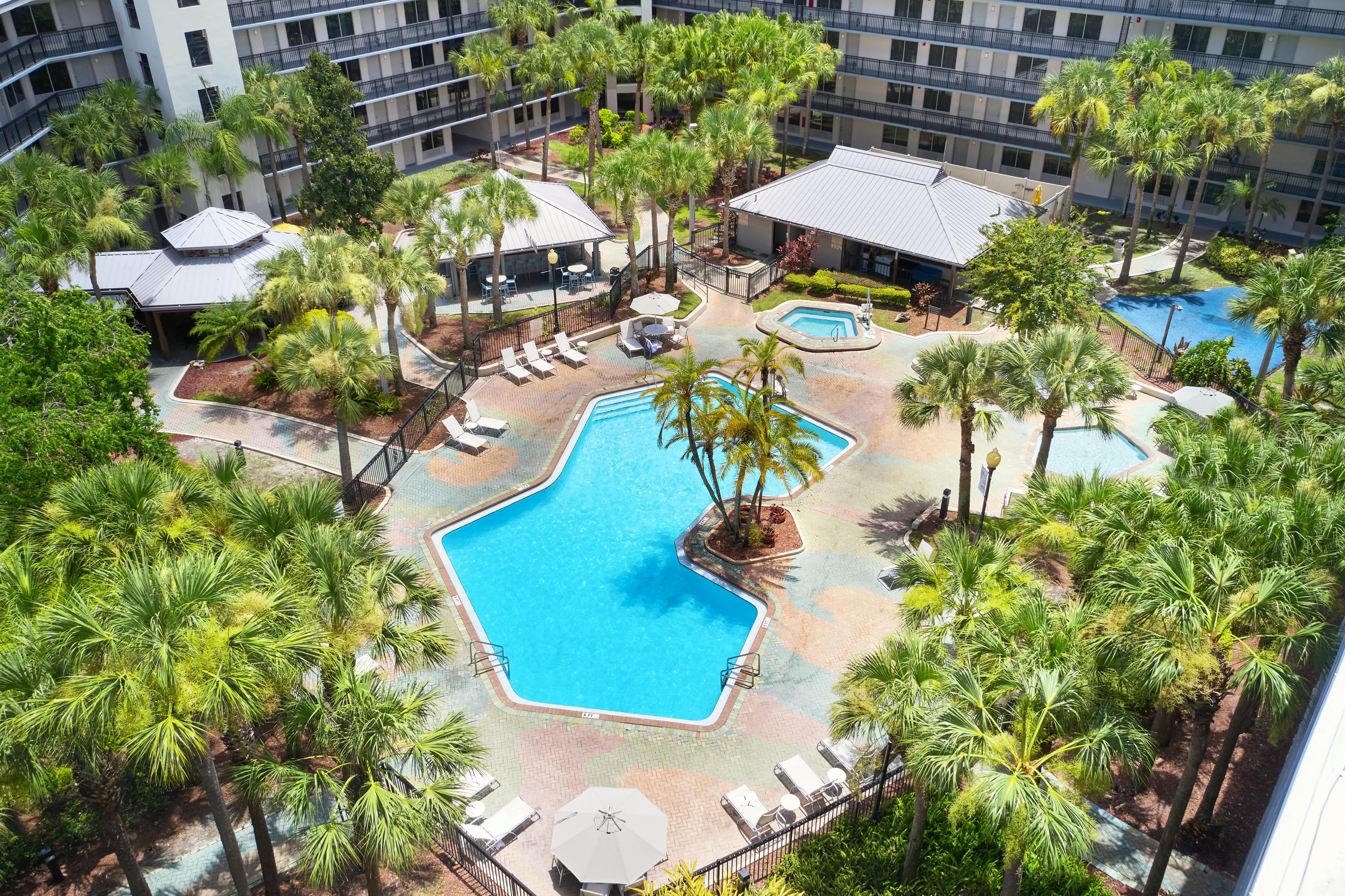 Explore Orlando, then unwind in our sparkling outdoor pool. Relax in a lounge chair, soak in the hot tub, and enjoy the tropical vibe. From 5 p.m. to midnight, sip refreshing drinks, beer, and wine at our lively poolside bar, The Dive (weather permitting). Or gather for a family BBQ at our outdoor grills.