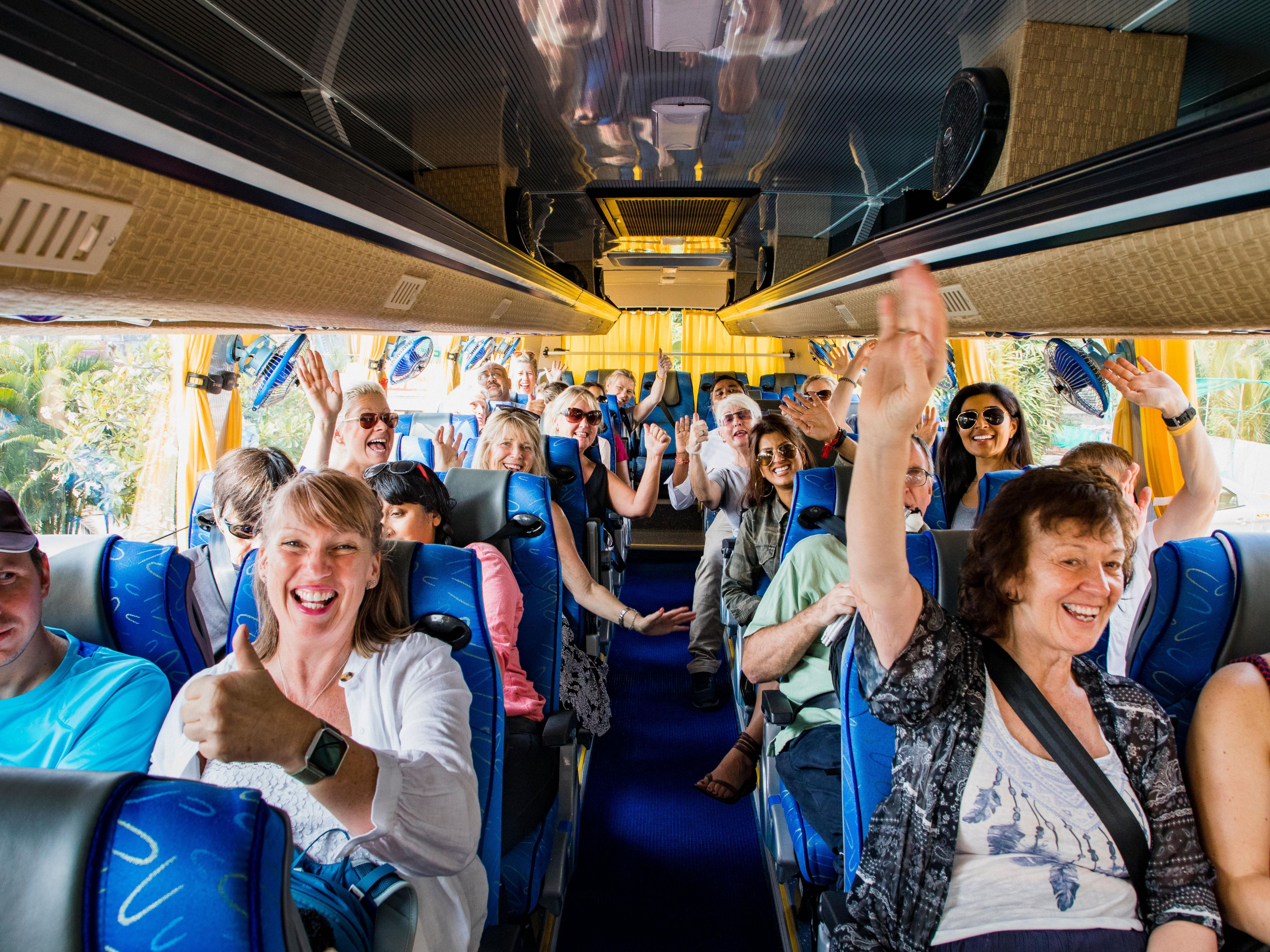 Group on a complimentary theme park shuttle