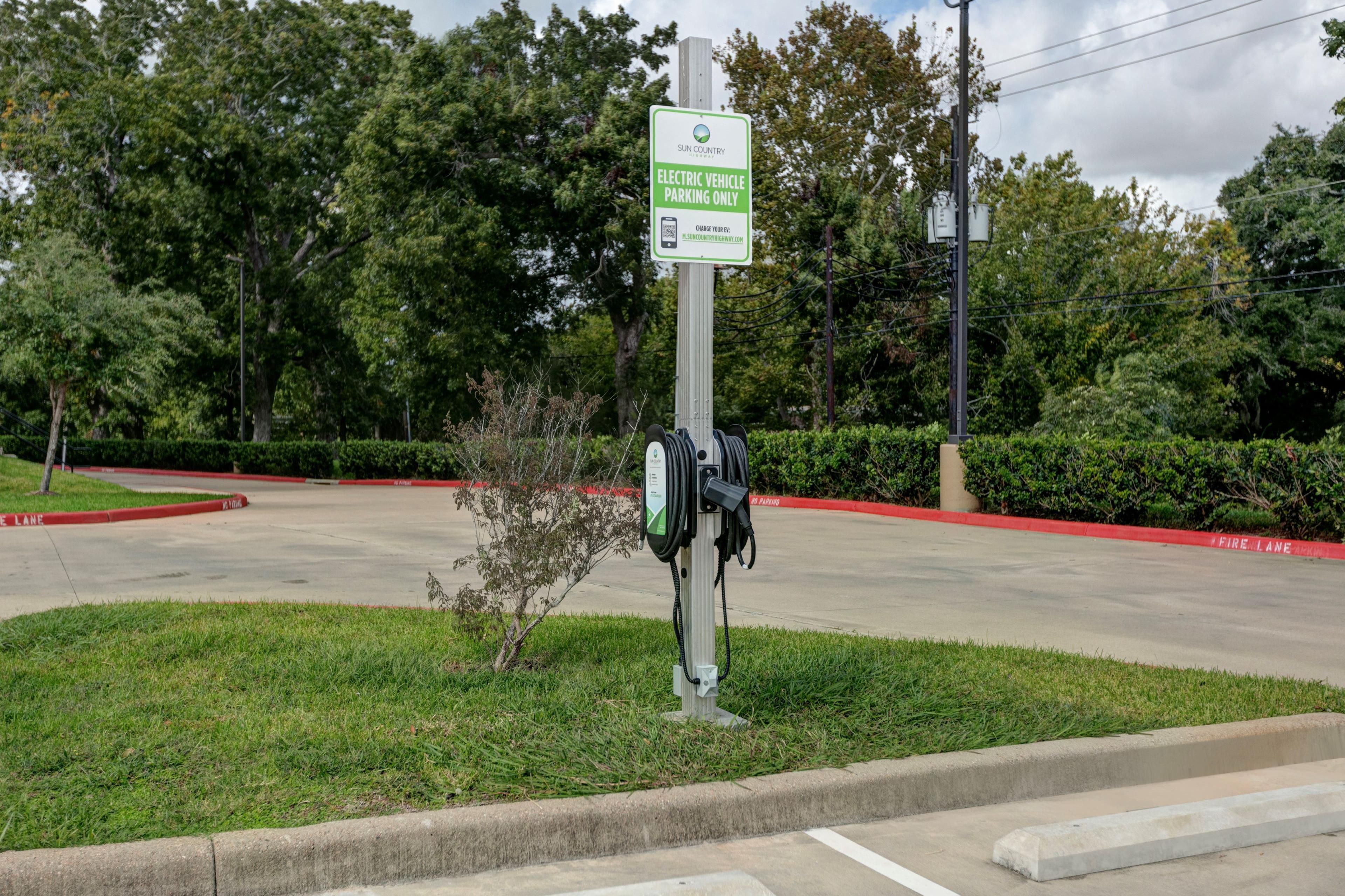 Electric car charging station on site for hotel guest.  