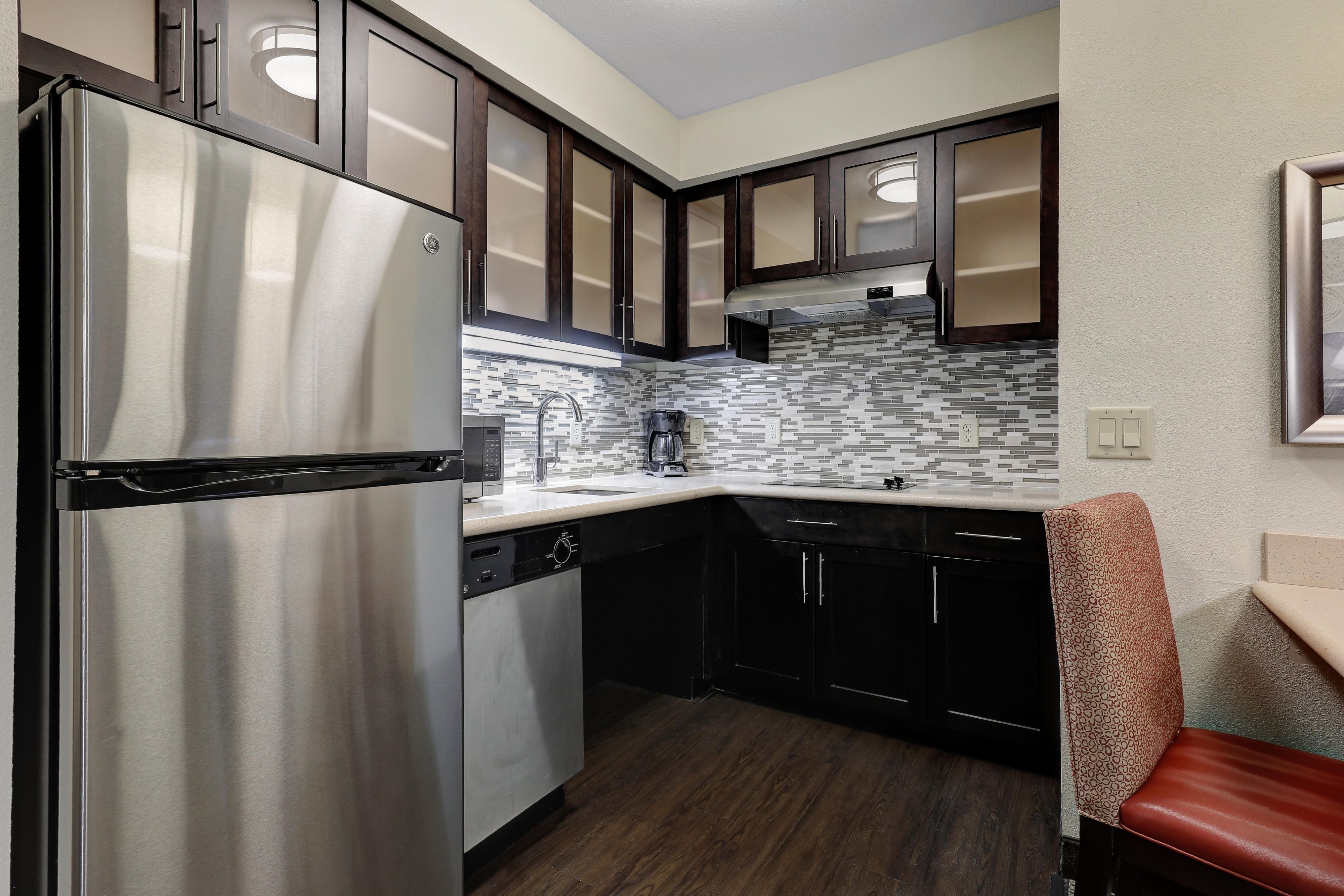 The convenience of home is found in our suites that all include a full kitchen complete with full-sized appliances. Essentials such as plates, glasses, silverware, cooking utensils, stovetop, dishwasher, microwave, coffee maker, toaster and more are provided. Our set up is convenient -no need to overpack!