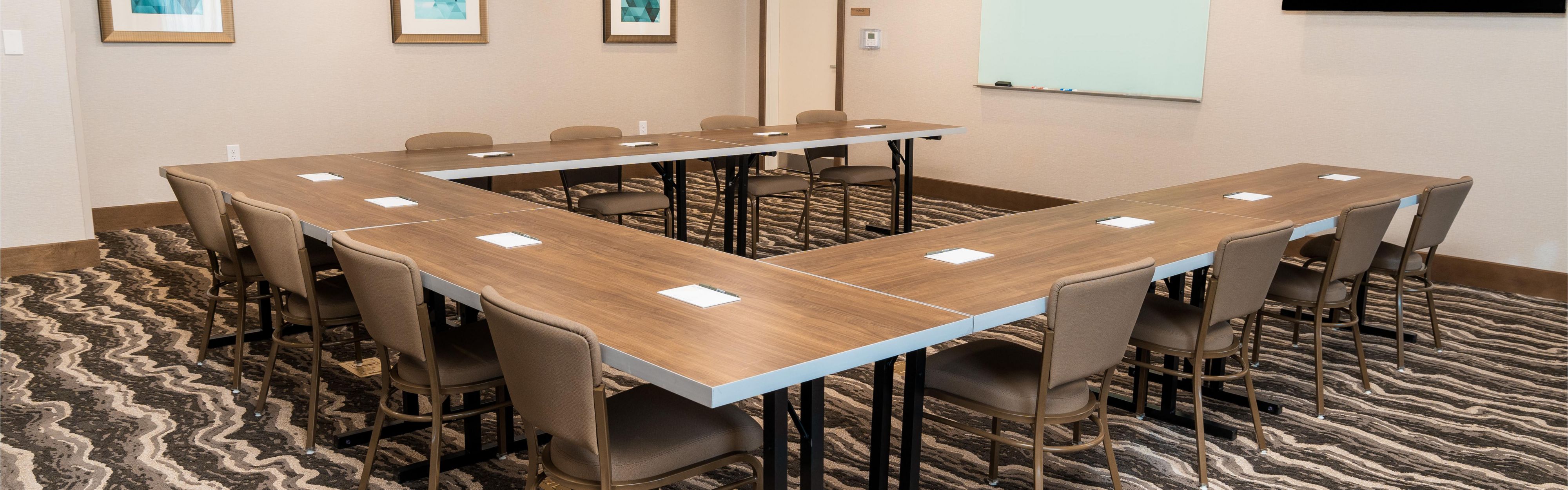 The meeting room is available for rent in several configurations.