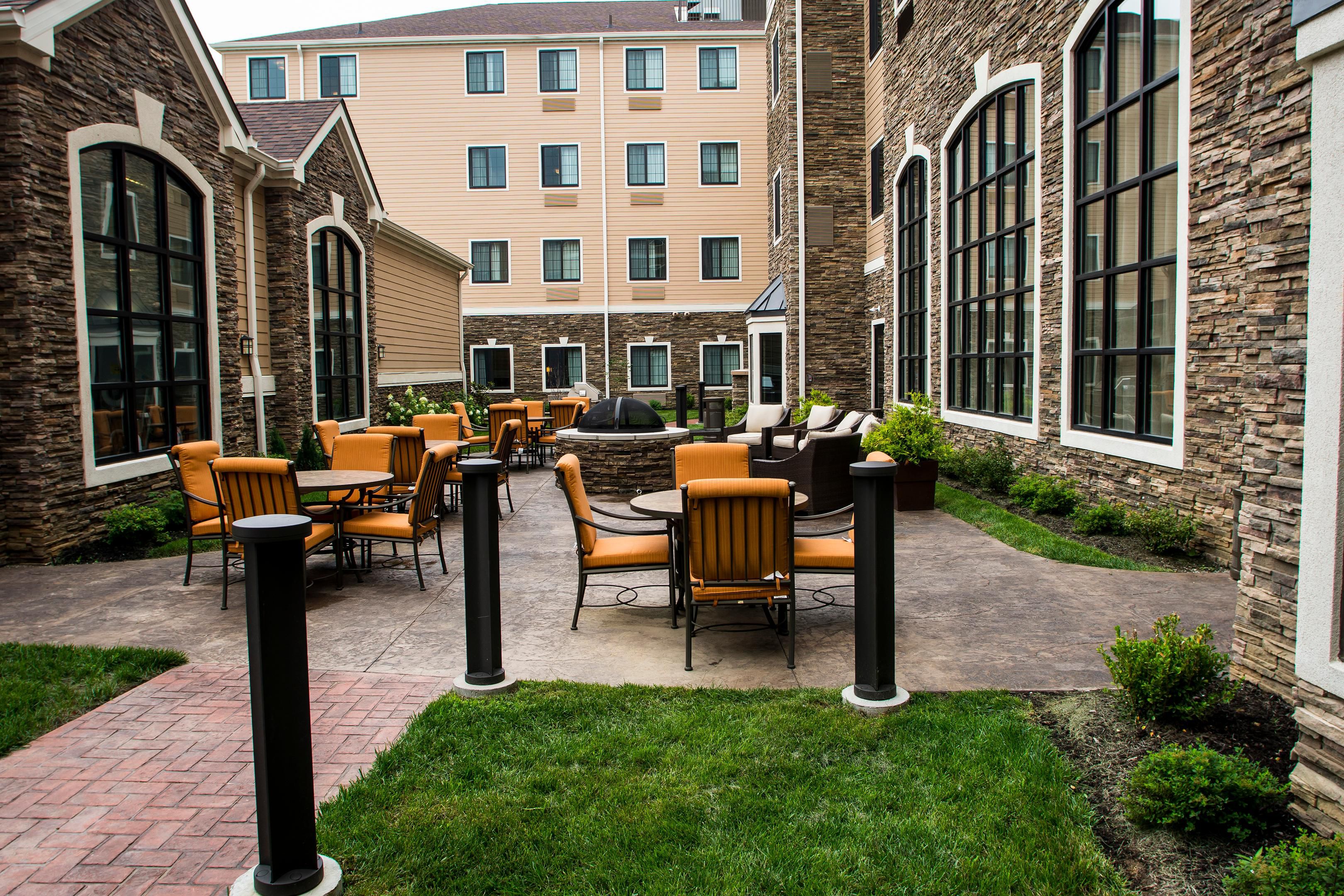 Don't fill cooped up in your room. Enjoy our Beautiful Outdoor Terrace, with built-in gas grills.  Enjoy the sun under the beautiful Pergola while you are grilling with family and friends, and If the weather gets a little chilly, you can always enjoy the warm and toasty Firepit.
Call 859 233 2300 to book your room!

