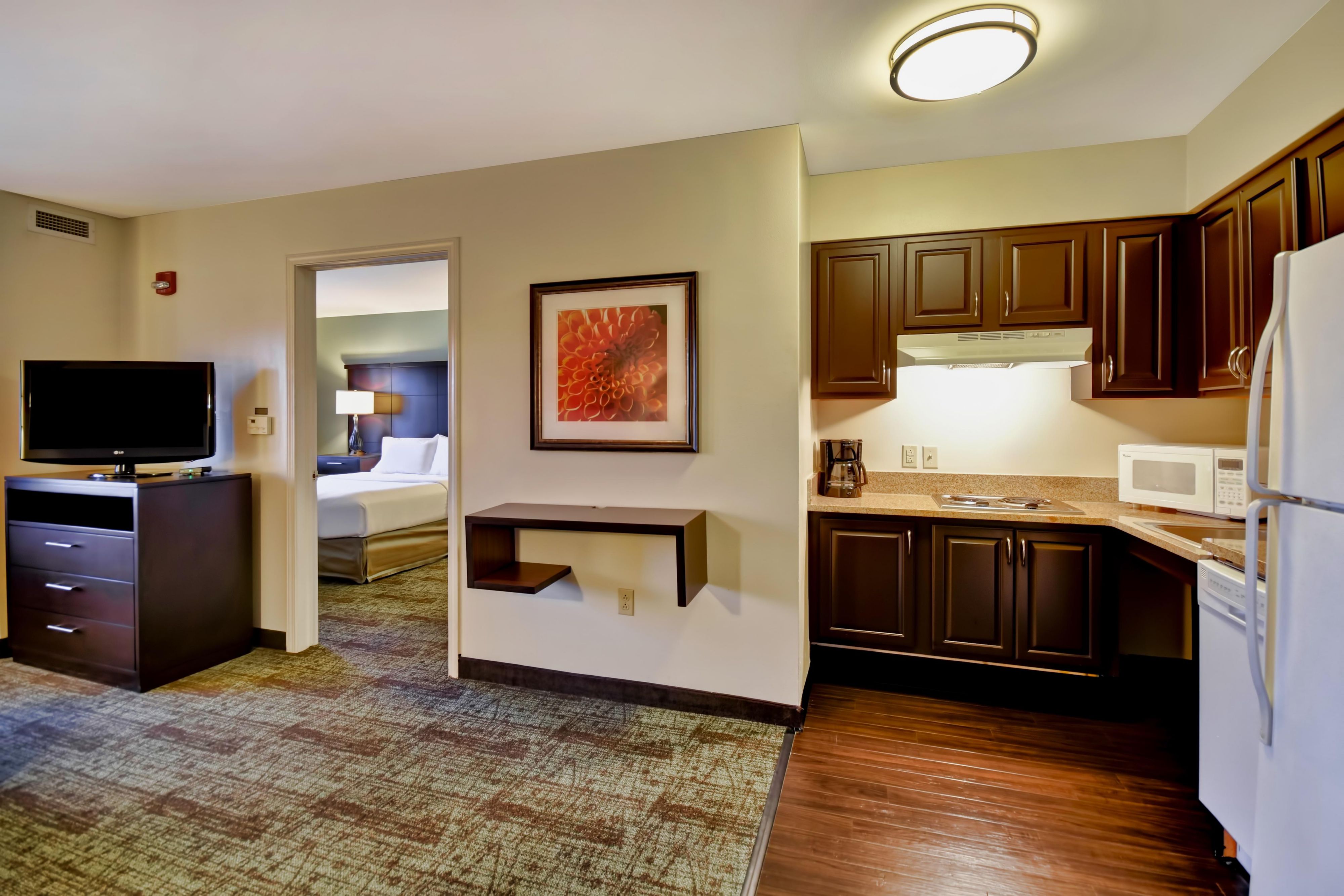 Our studio suites and one- and two-bedrooms suites are beautifully appointed and offer all the comforts of home, including spacious living and sleeping areas, fully equipped kitchens with full-size refrigerator, dishwasher and stove top, large workspace, complimentary laundry facility, outdoor living areas and more.