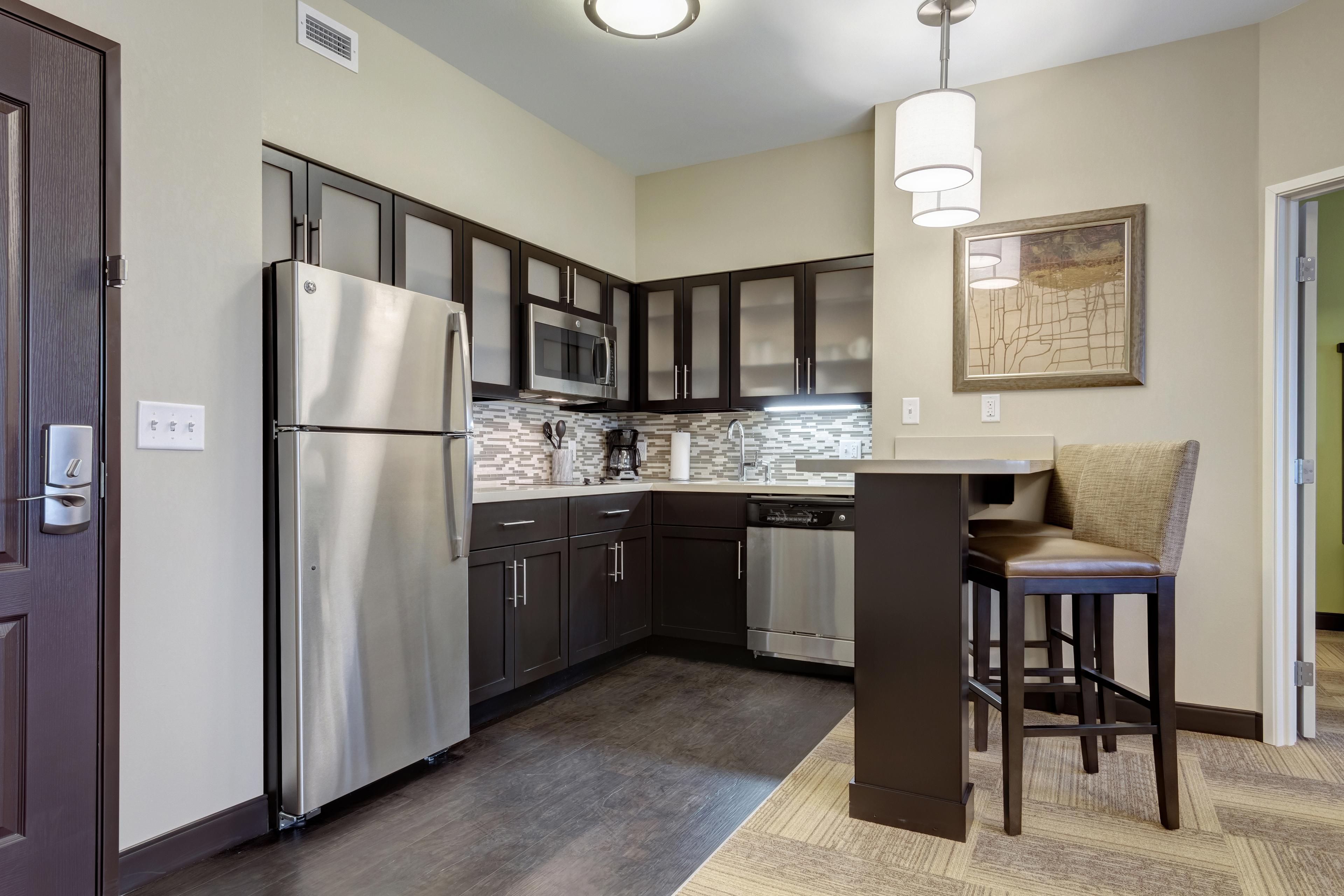 Every room in our property includes a kitchenette equipped with a full sized refrigerator, dual stove top burner, coffee maker, dish washer, microwave, toaster, dining ware, flat ware, and cooking utensils. Enjoy the comfort of a home cooked meal away from home! 