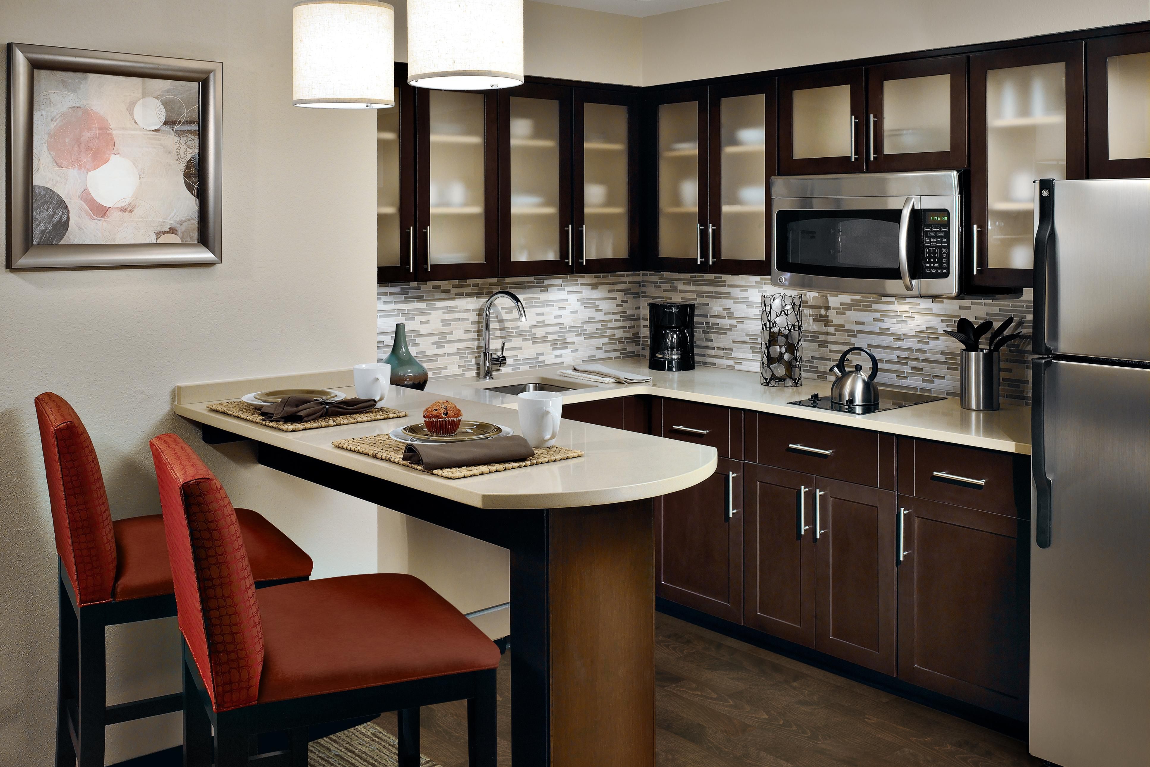 Make yourself at home in our Tysons Corner extended stay suites offering studio, one-bedroom, or two-bedroom suite floor plans. Each room includes a fully equipped kitchen, including all tools and utensils to create your favorite homemade dish. Complete your stay comfortable beds, flexible workspaces, and flat screen TVs with premium channels. 