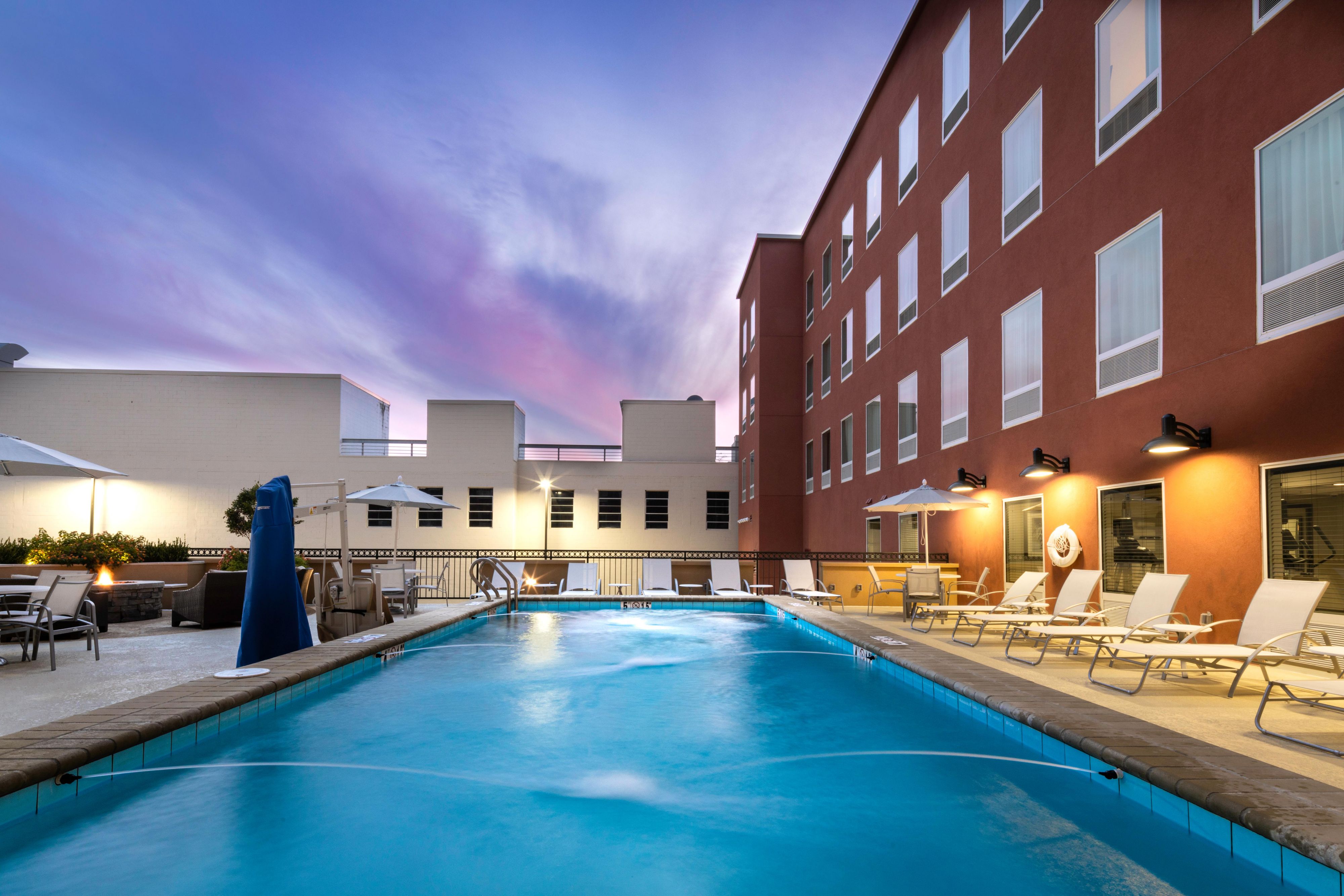Fitness Center: Stay active in our well-equipped fitness center, available 24/7 for your convenience.
Outdoor Pool: Relax and rejuvenate by our outdoor pool, perfect for a refreshing dip after a long day.