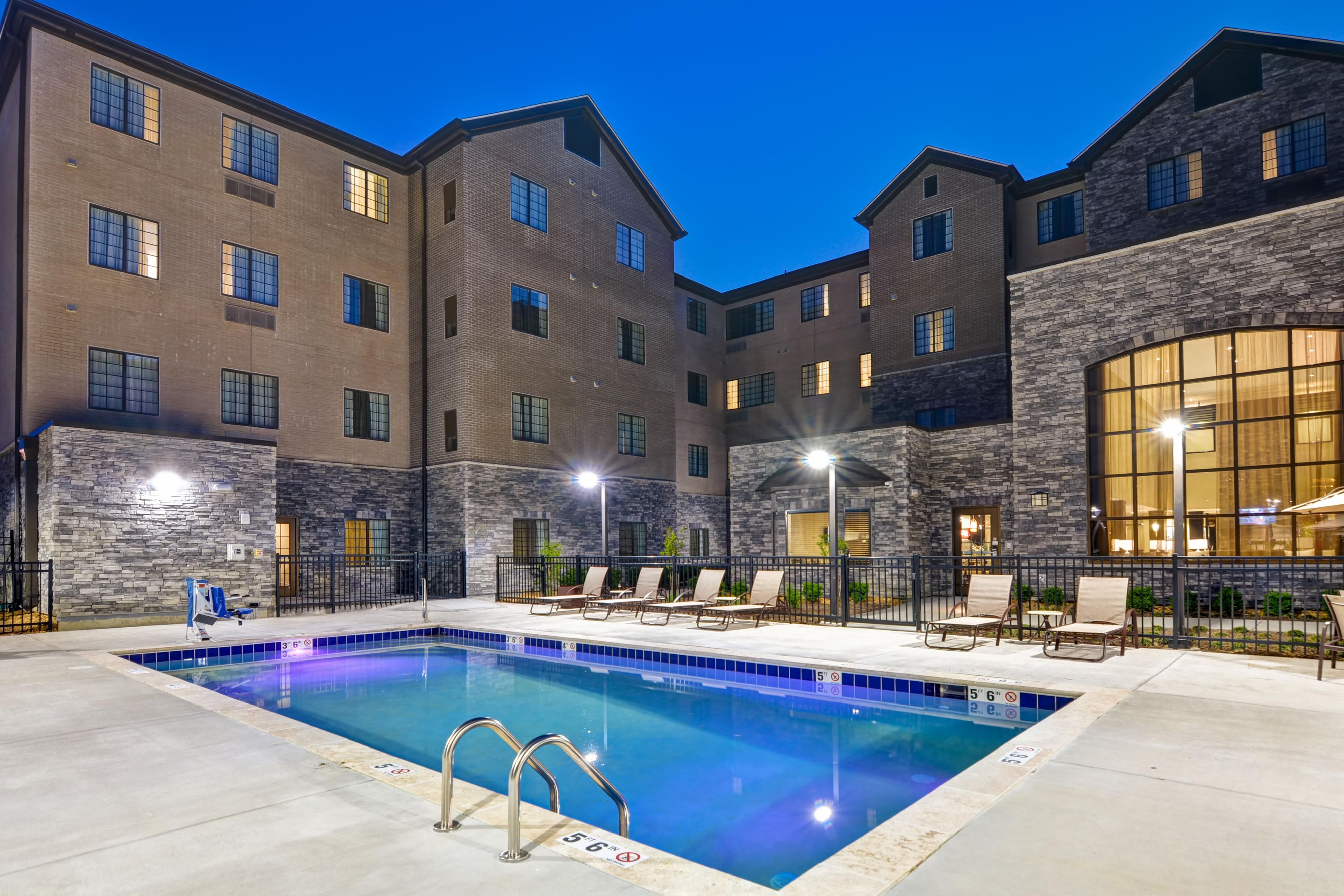 Enjoy our outdoor patio and pool oasis, complete with lounge chairs, a cozy gazebo with table and chairs, gas grill, and a firepit. Take a refreshing dip in our sparkling pool and then enjoy a charming cookout using our complimentary gas grill. Gather around the firepit, warm up on cool evenings, and dine beneath the stars.