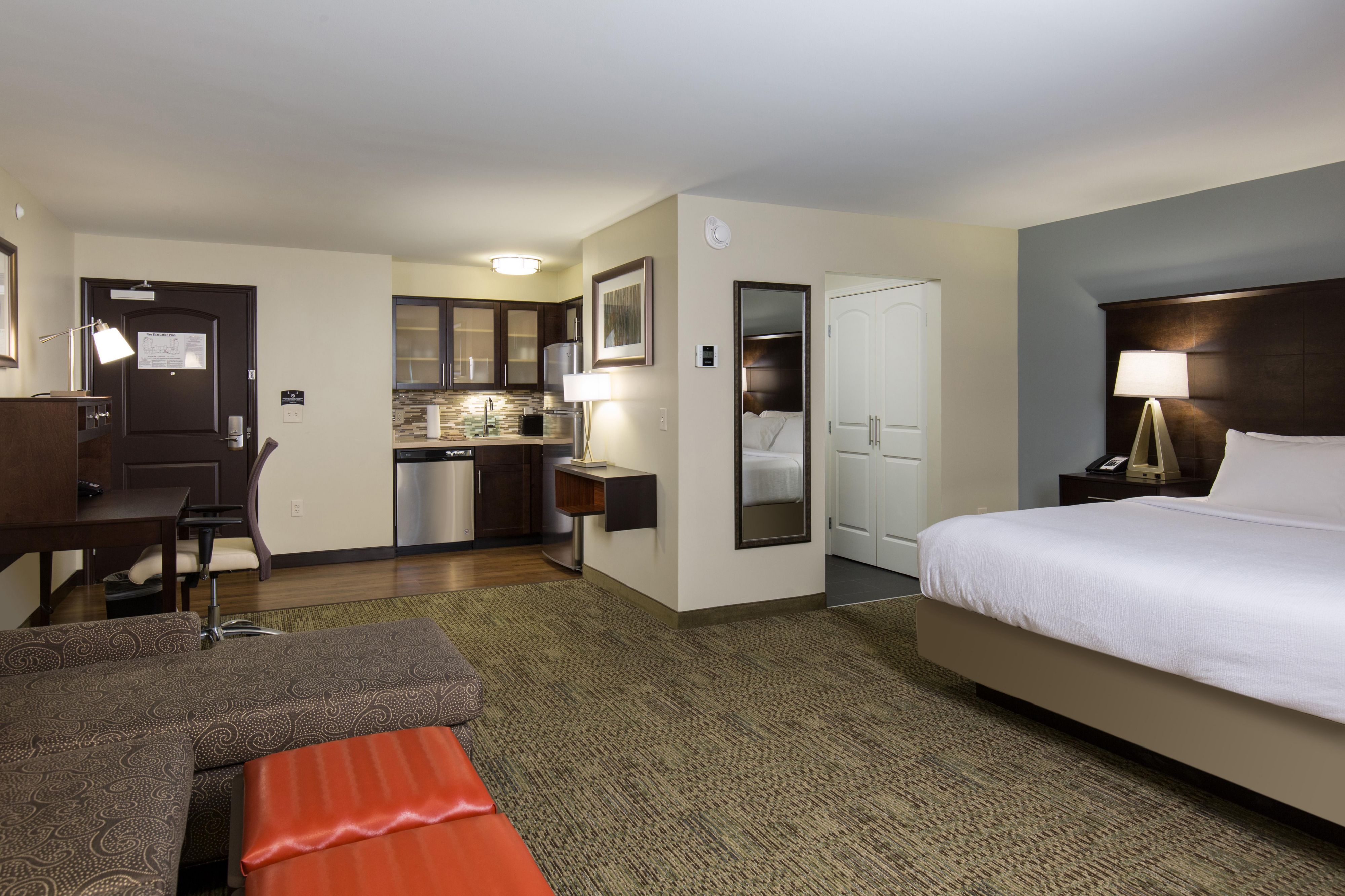 Nothing beats having a home-cooked meal prepared by the best chef. You! Our brand new hotel features full kitchens in every room, FREE laundry facilities, a huge on-site fitness center, and relax in our heated pool after hours or sit around our firepit. Call us to inquire about an extended stay rate.