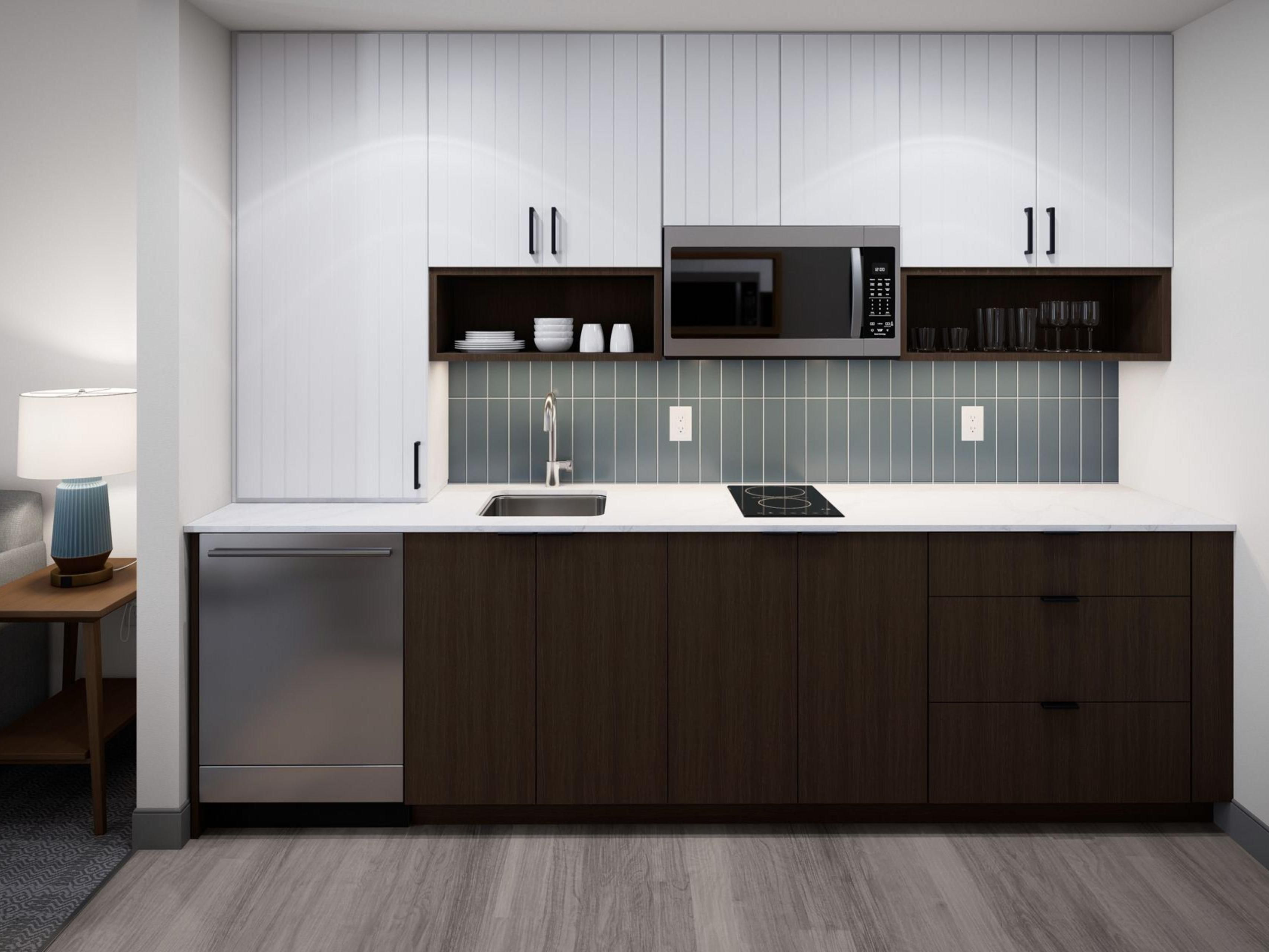 In-room kitchenette with mini-fridge and cooktop