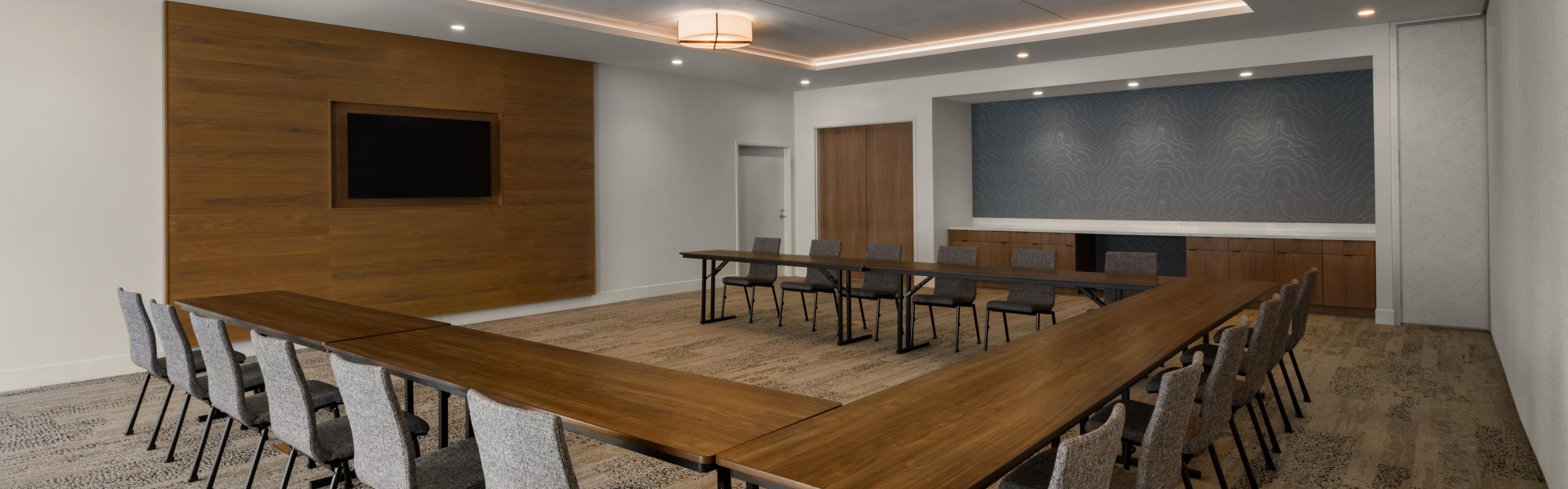 Host your next meeting in our versatile horseshoe setup.
