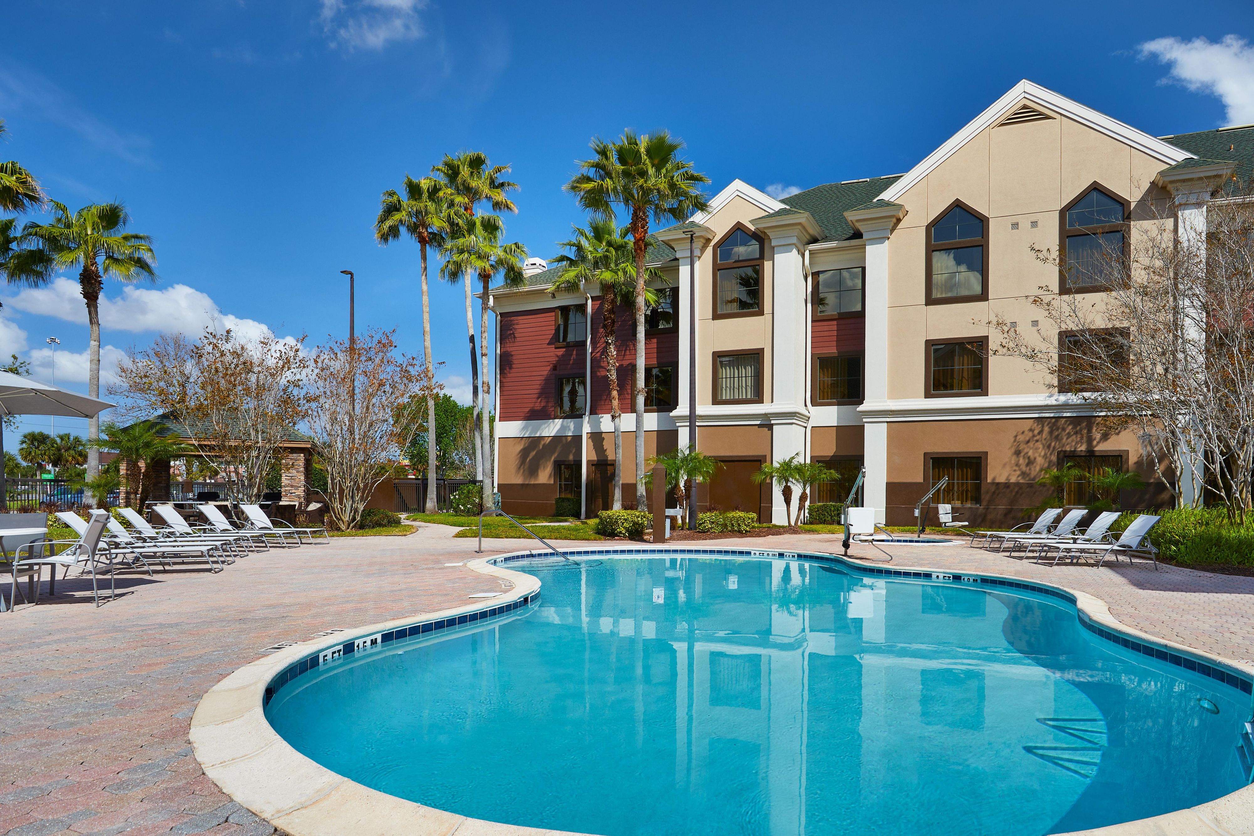 Welcome to the Staybridge Suites Orlando Airport South. Besides our spacious suites, we also provide you with access to BBQ areas, outdoor pool, and a basketball court so that you can have a  fun and productive stay at our hotel at Orlando Airport!