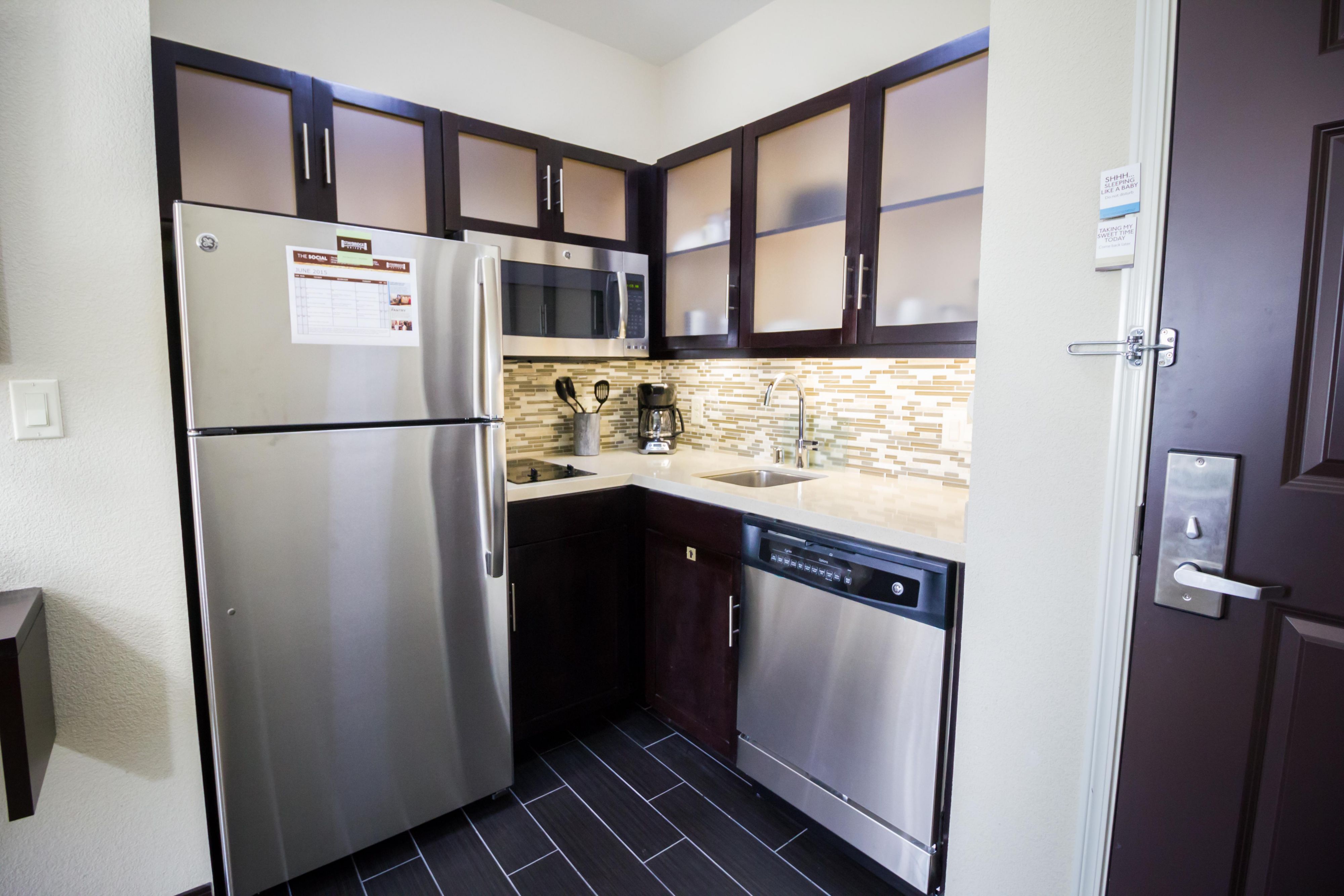 All our rooms have full kitchens with refrigerator, microwave, dishwasher, dishes, and stove. You and your family will love the kitchens at our hotel! They offer everything you need to prep, cook, enjoy and store your favorite dishes, they are perfect for long stays. 