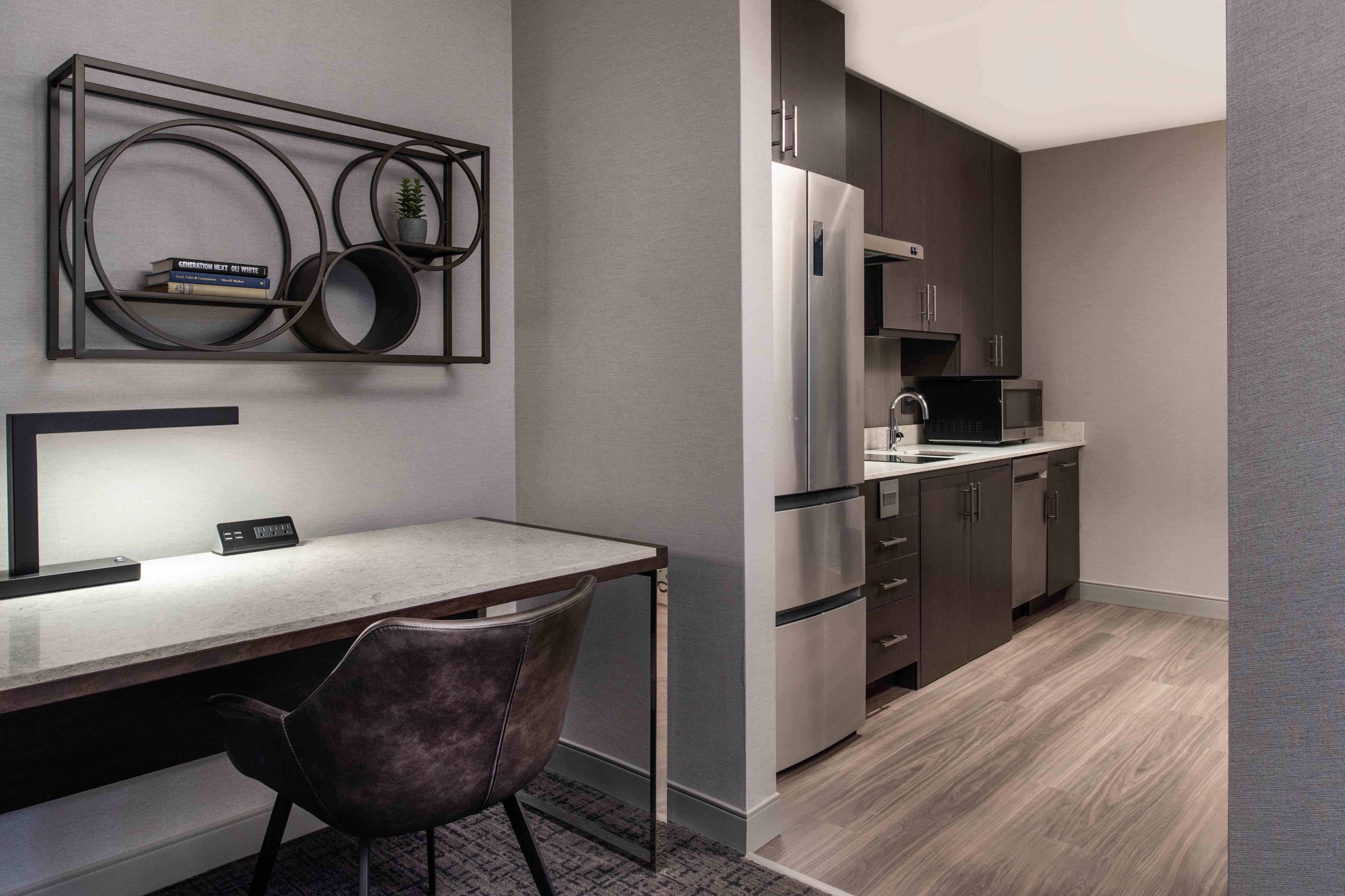 Stay longer, comfortably! Our extended stay rooms feature a full kitchen, perfect for home-cooked meals and added convenience. Enjoy spacious living designed for your extended visit.