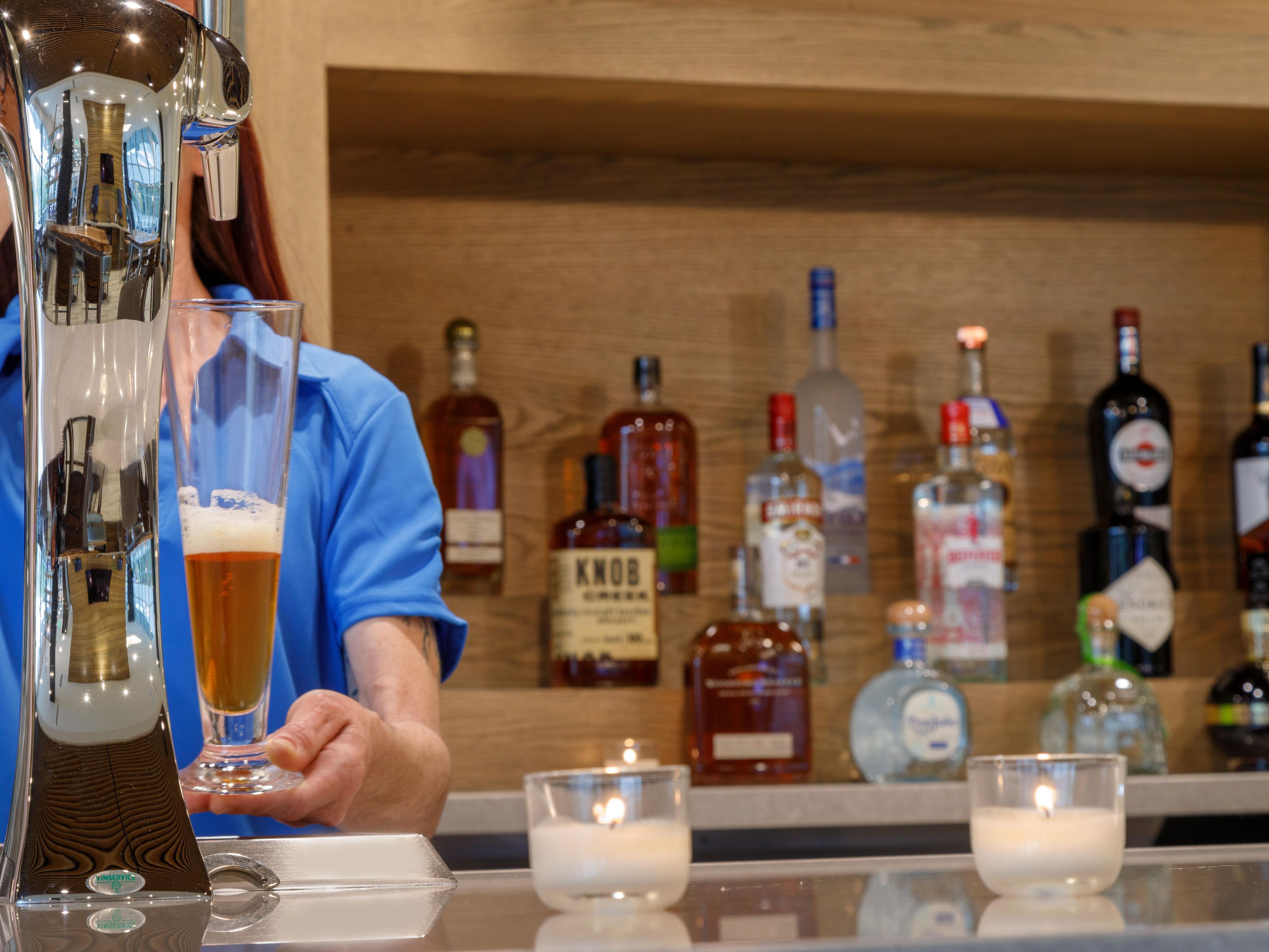 Bartender pouring a beer