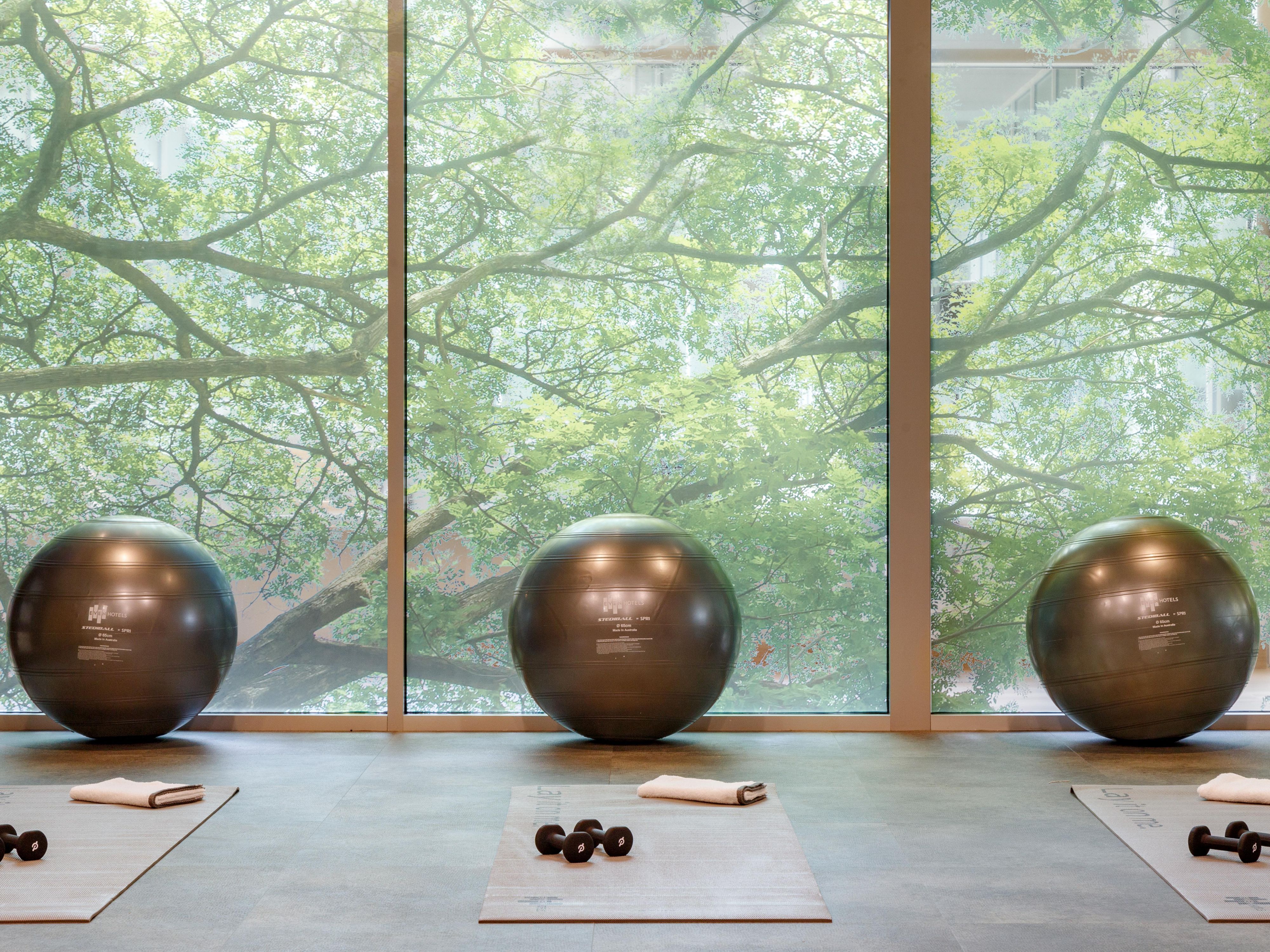 Medicine balls and yoga mats